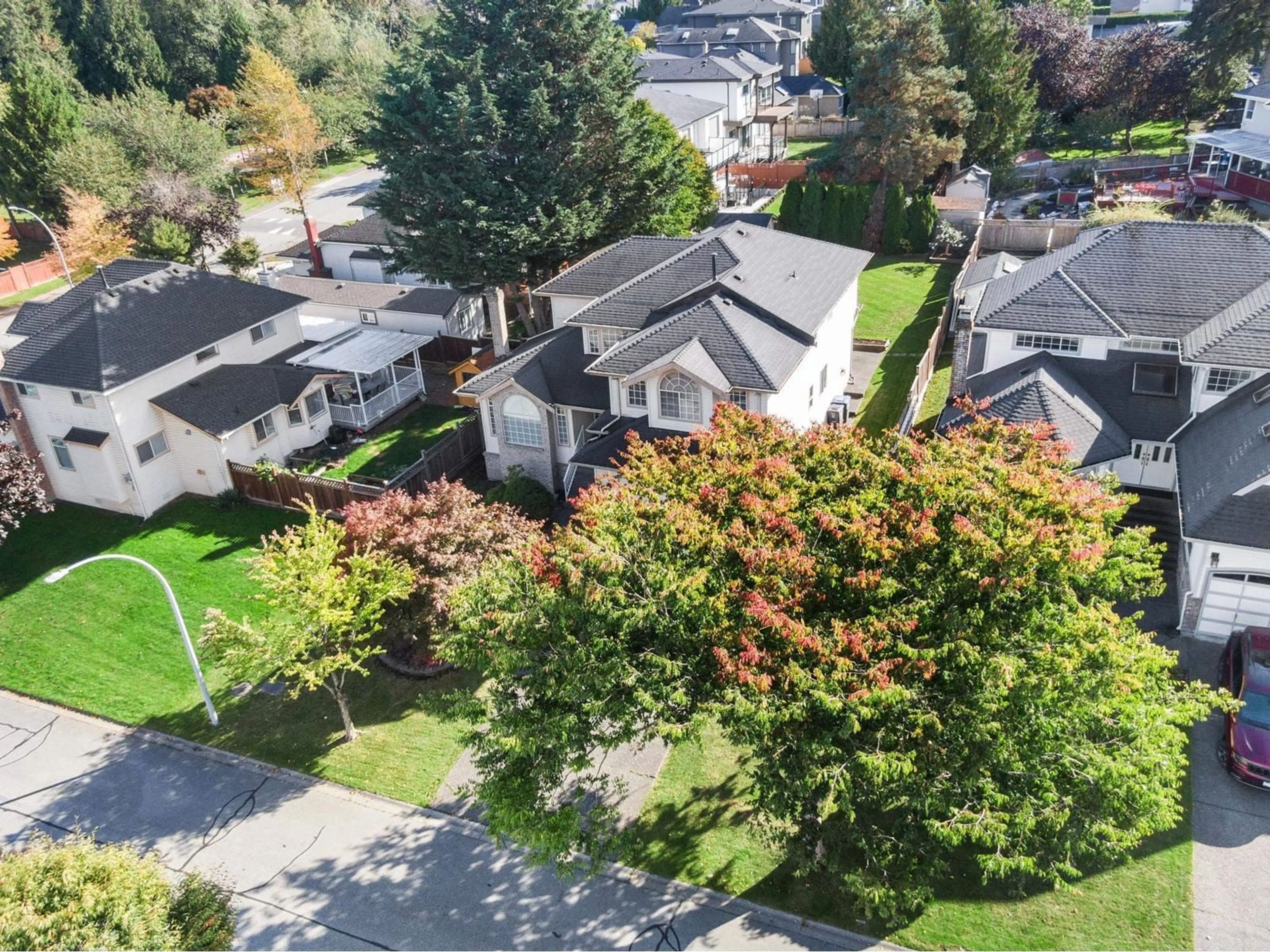 A pic from outside/outdoor area/front of a property/back of a property/a pic from drone, street for 12236 67A AVENUE, Surrey British Columbia V3W0L9