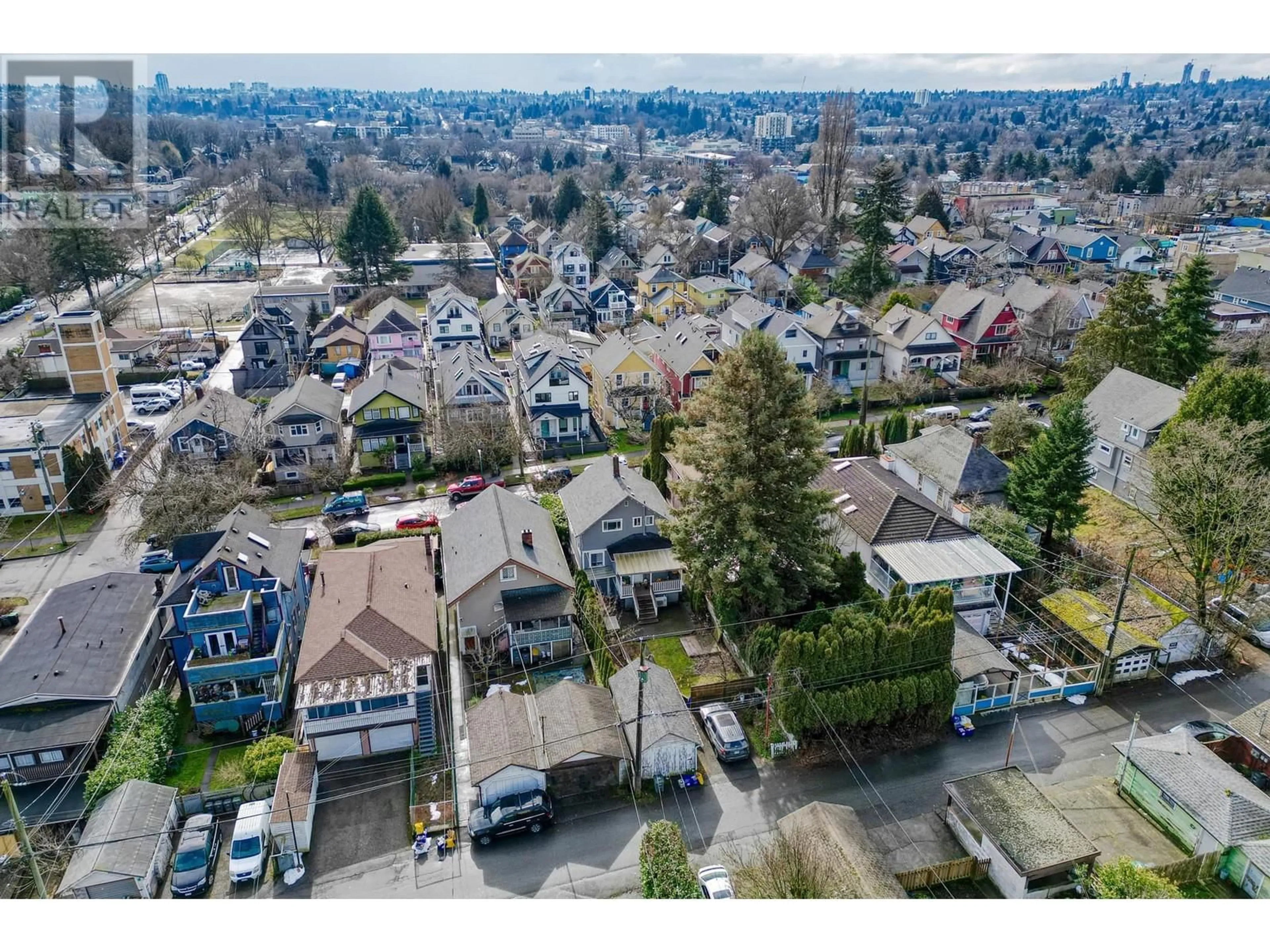 A pic from outside/outdoor area/front of a property/back of a property/a pic from drone, street for 1839 2ND AVENUE, Vancouver British Columbia V5N1E3