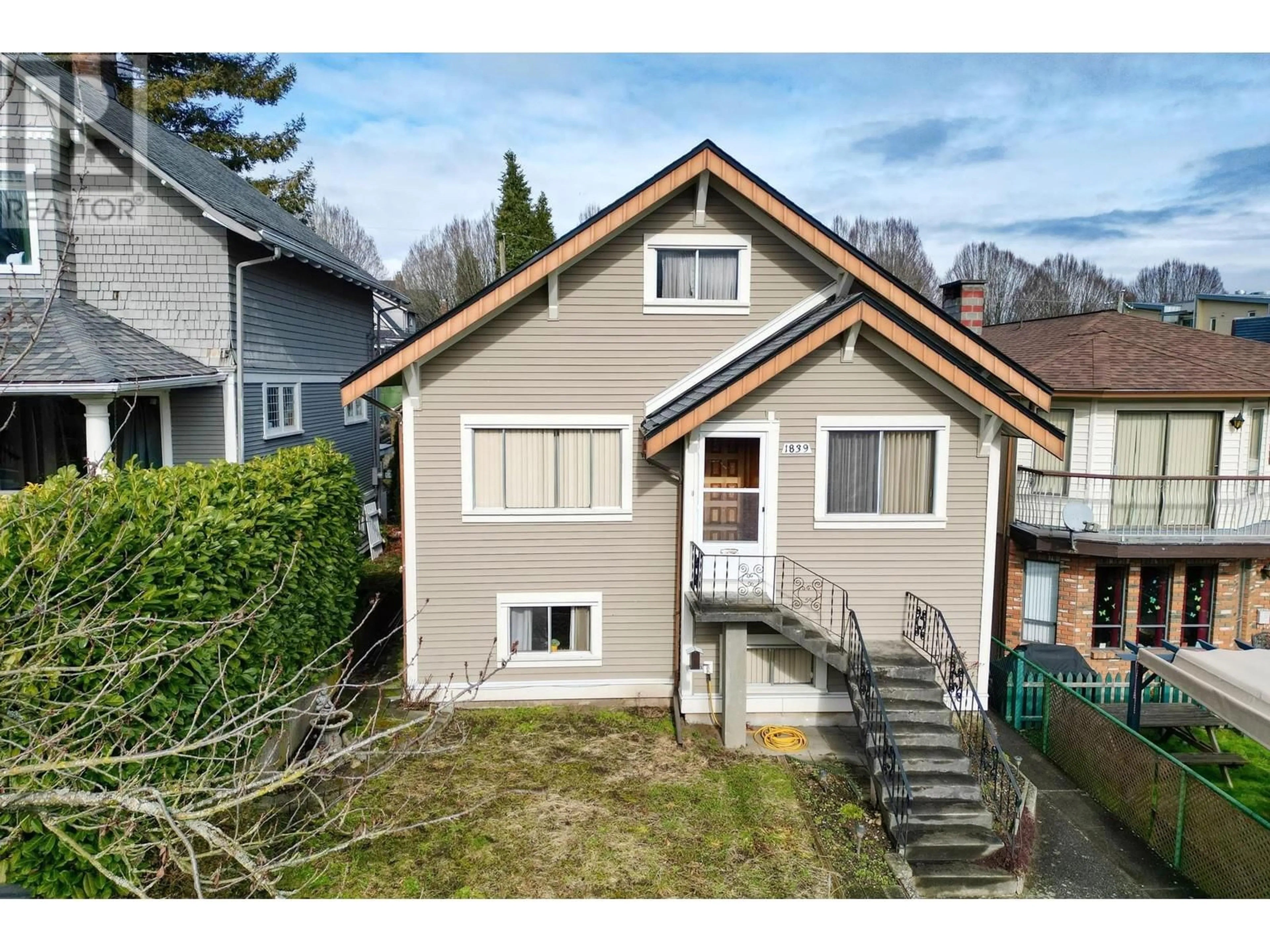 A pic from outside/outdoor area/front of a property/back of a property/a pic from drone, street for 1839 E 2ND AVENUE, Vancouver British Columbia V5N1E3