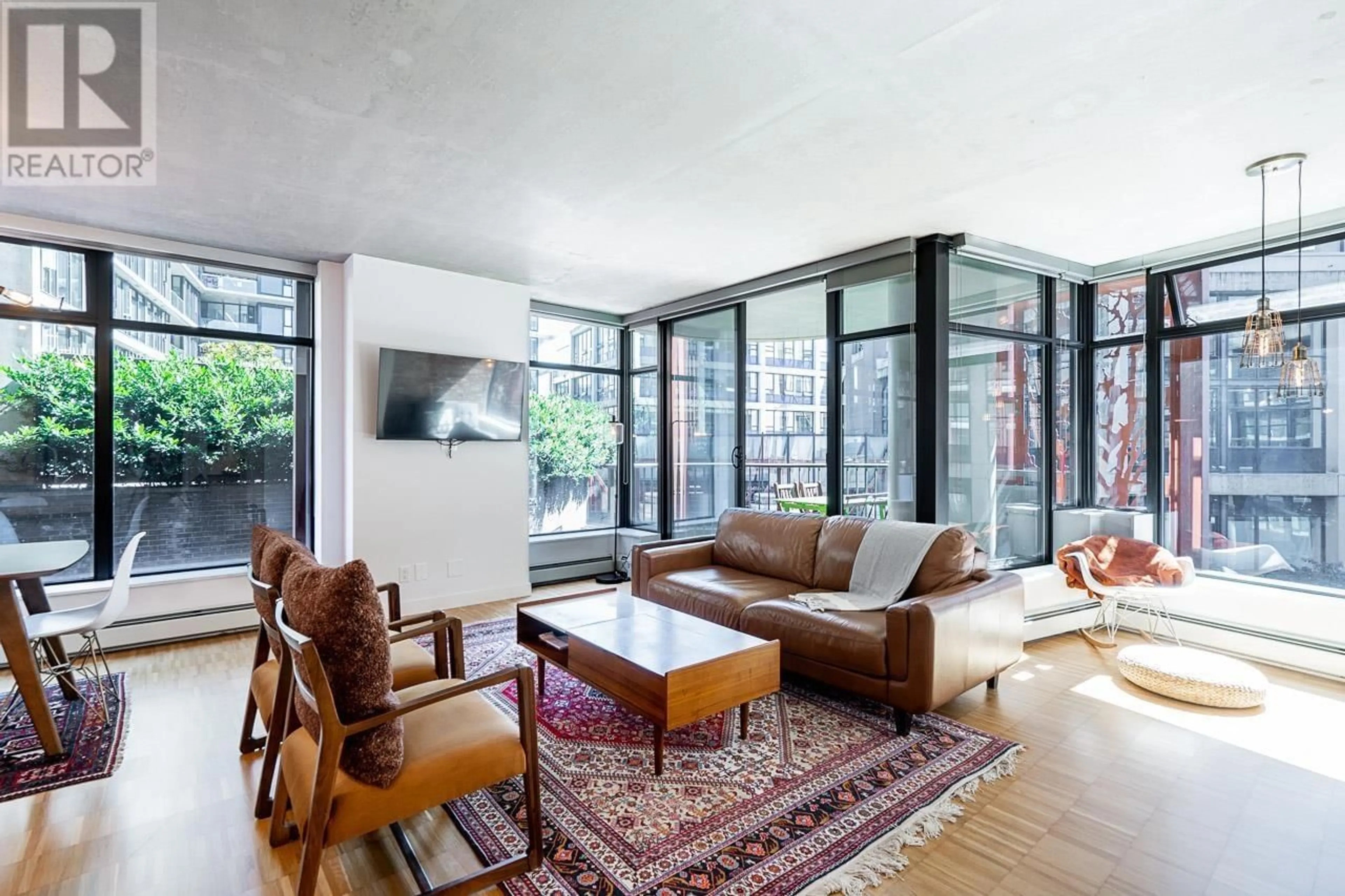 Living room with furniture, cement floor for 706 128 W CORDOVA STREET, Vancouver British Columbia V6B0E8