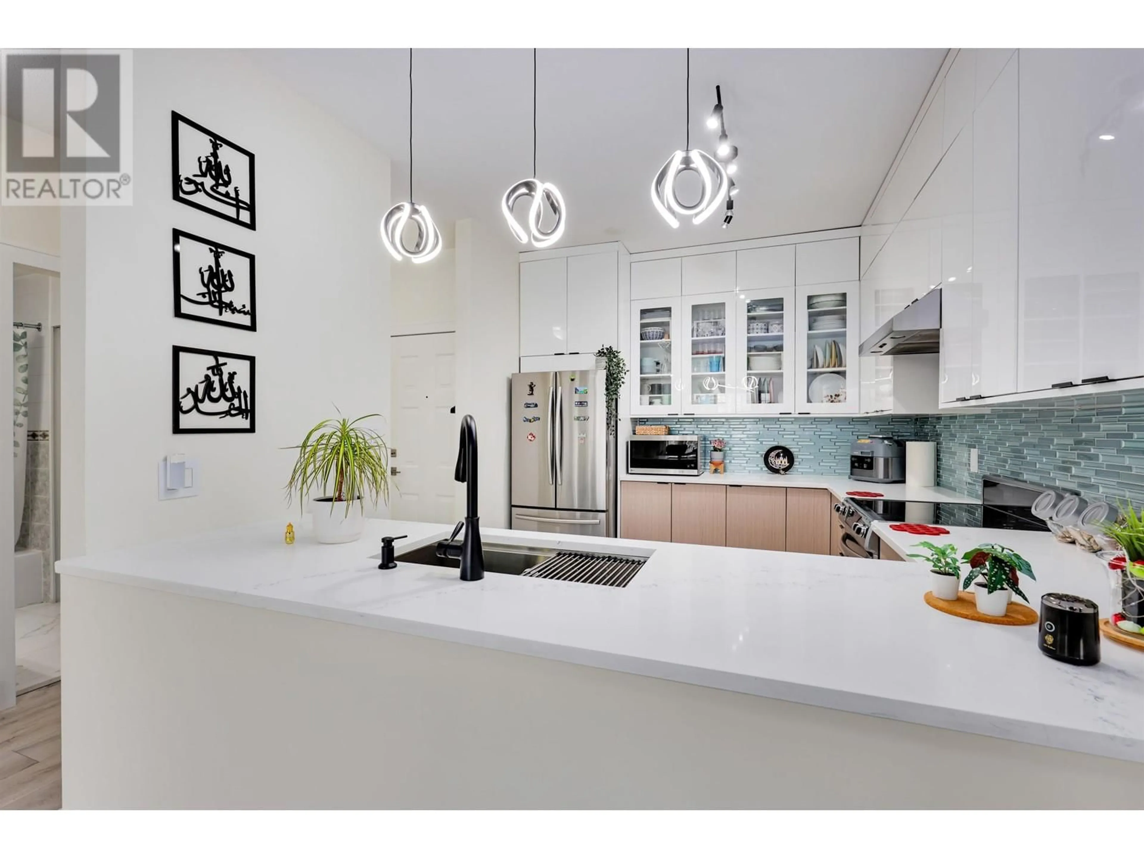 Contemporary kitchen, ceramic/tile floor for 208 - 83 STAR CRESCENT, New Westminster British Columbia V3M6X8
