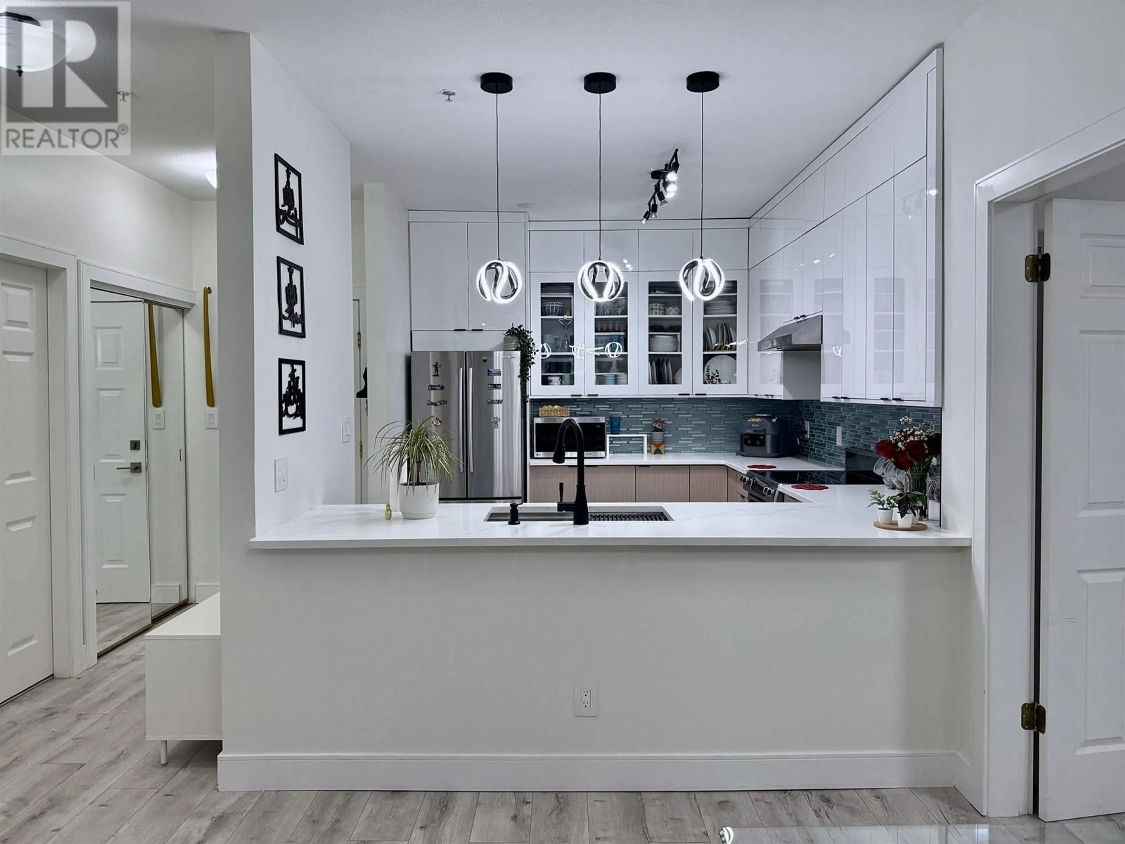 Contemporary kitchen, ceramic/tile floor for 208 83 STAR CRESCENT, New Westminster British Columbia V3M6X8