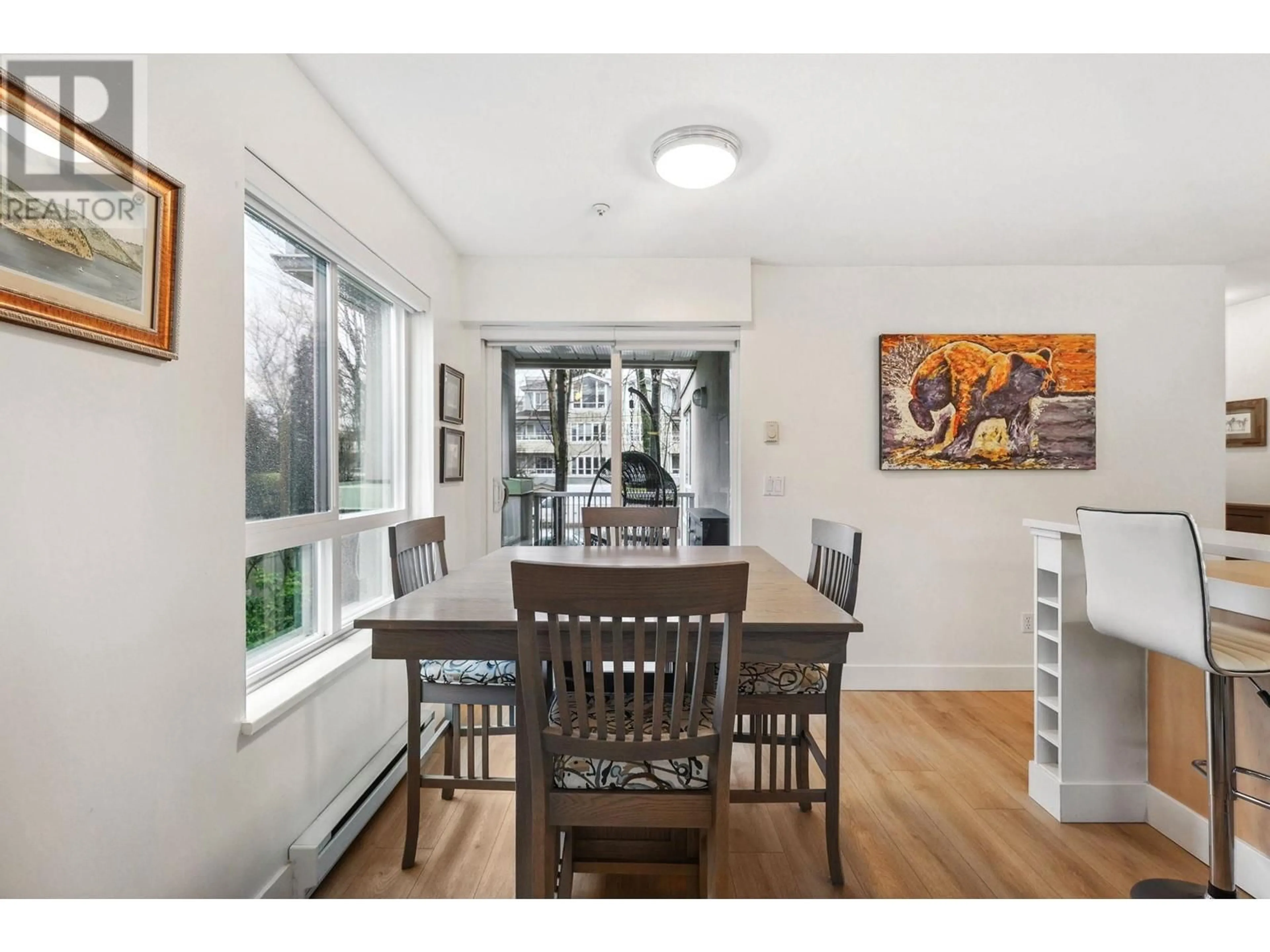 Dining room, wood/laminate floor for 209 3235 W 4TH AVENUE, Vancouver British Columbia V6K1R8