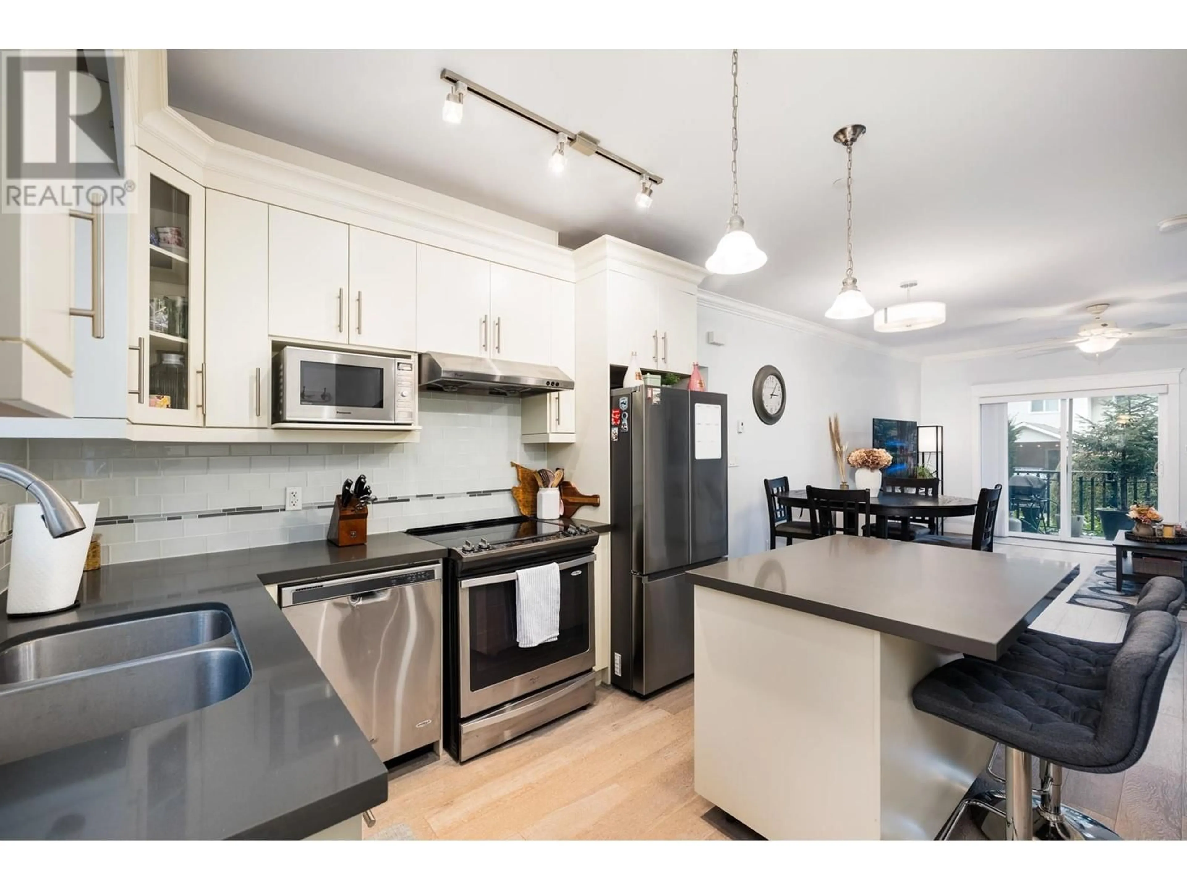 Open concept kitchen, unknown for 105 3488 SEFTON STREET, Port Coquitlam British Columbia V3B3R2