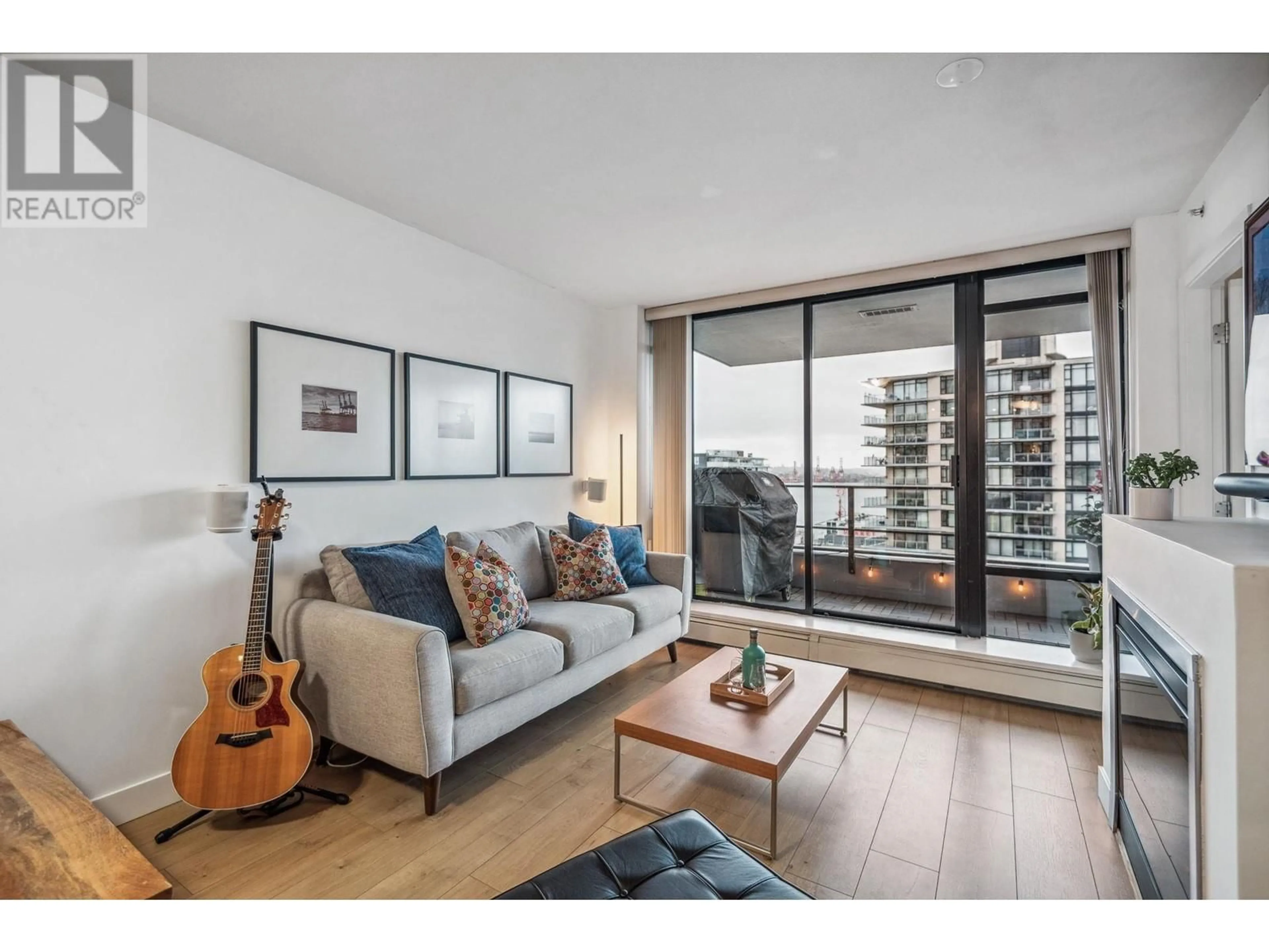 Living room with furniture, wood/laminate floor for 1002 151 W 2ND STREET, North Vancouver British Columbia V7M3P1