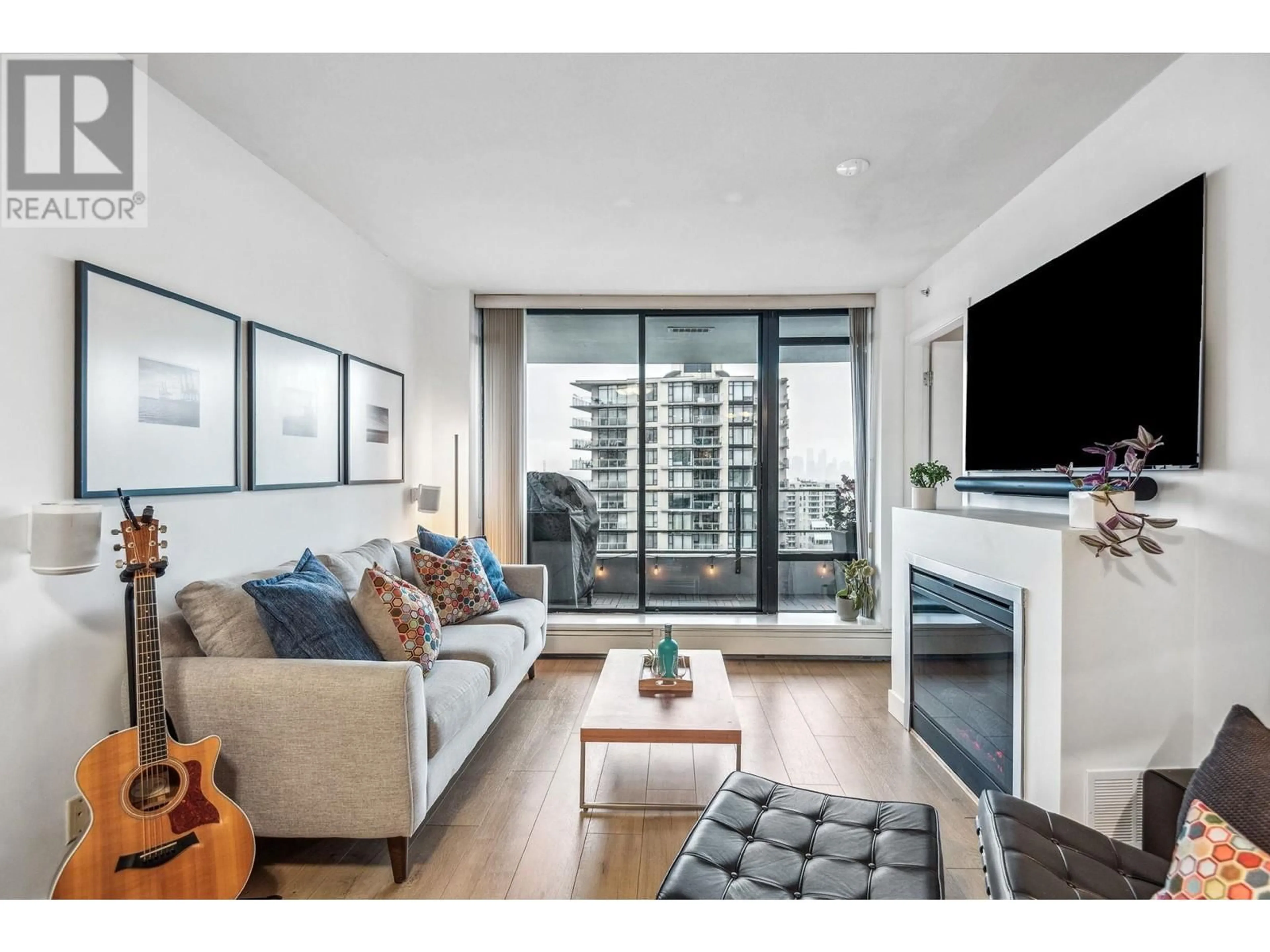 Living room with furniture, wood/laminate floor for 1002 151 W 2ND STREET, North Vancouver British Columbia V7M3P1