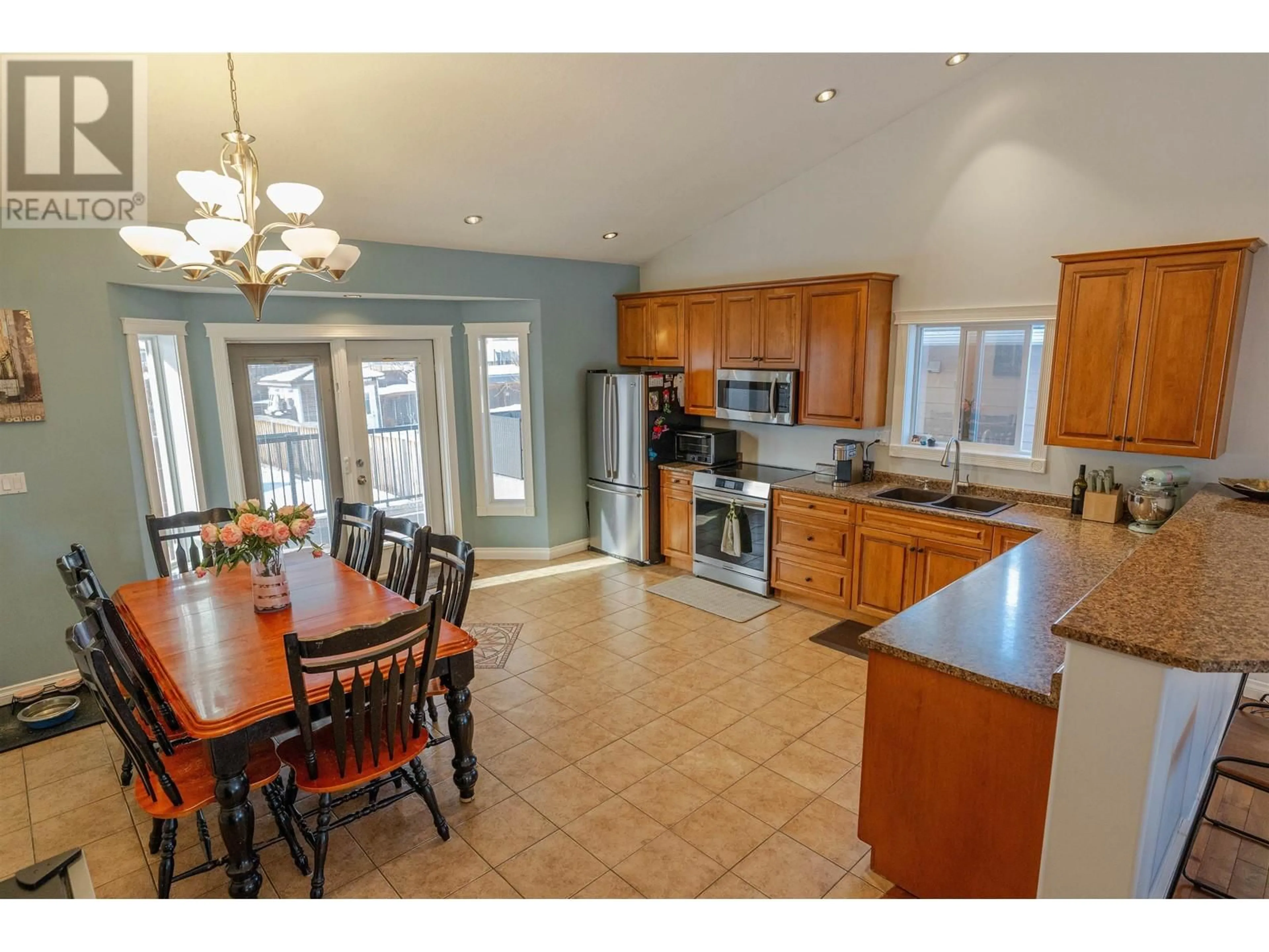 Open concept kitchen, ceramic/tile floor for 11112 88 STREET, Fort St. John British Columbia V1J0B9