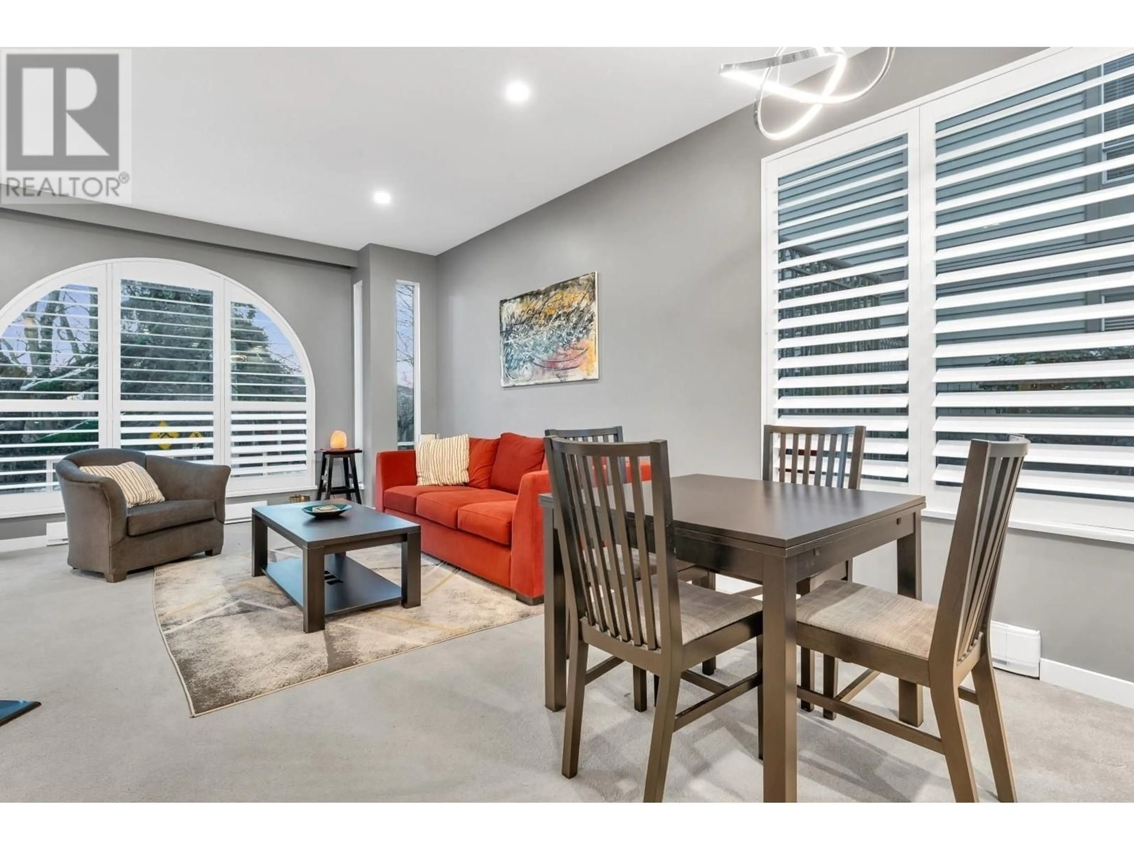 Living room with furniture, wood/laminate floor for 104 1100 W 7TH AVENUE, Vancouver British Columbia V6H1B4