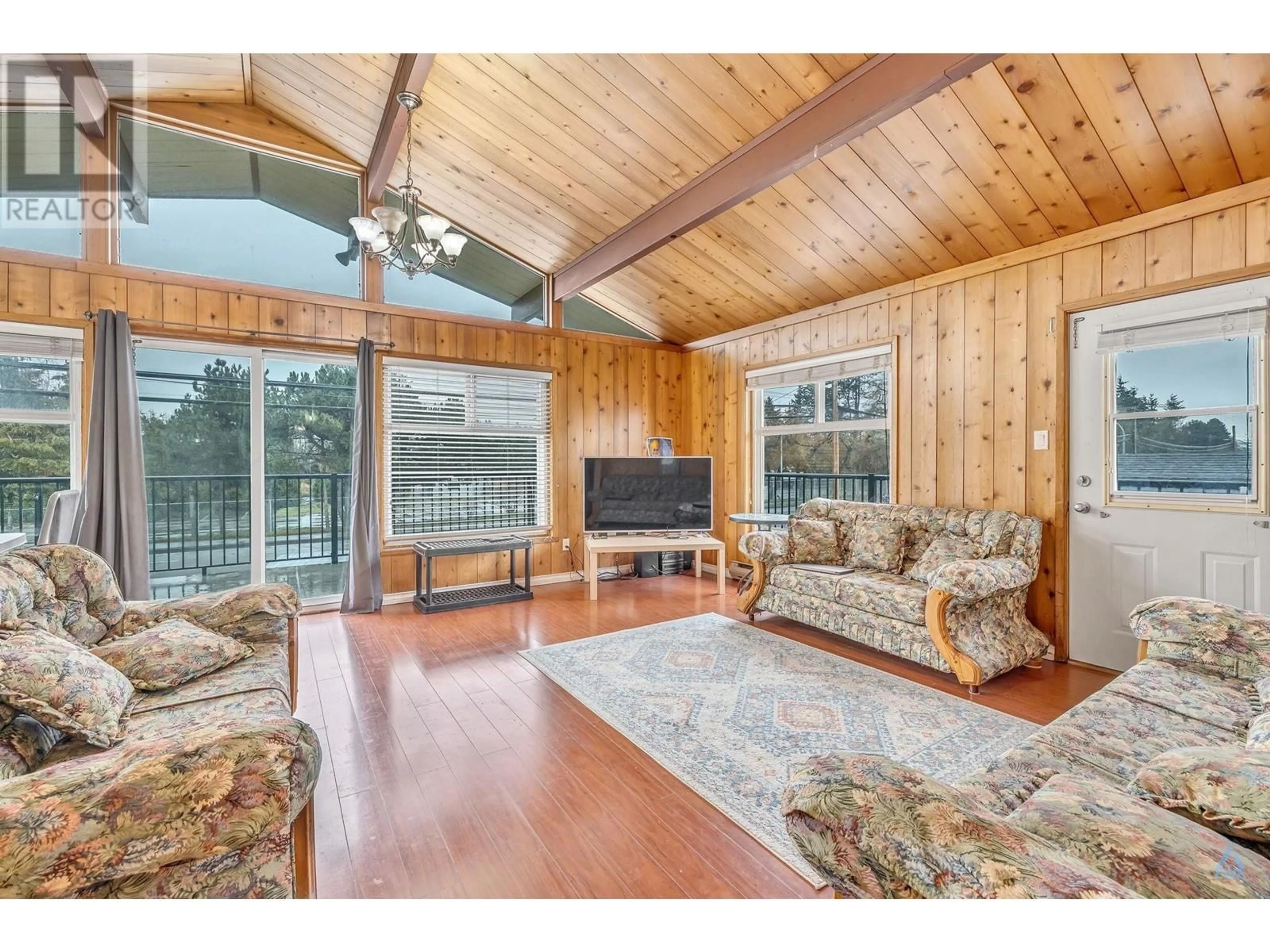 Living room with furniture, wood/laminate floor for 9491 NO 5 ROAD, Richmond British Columbia V7A4E3