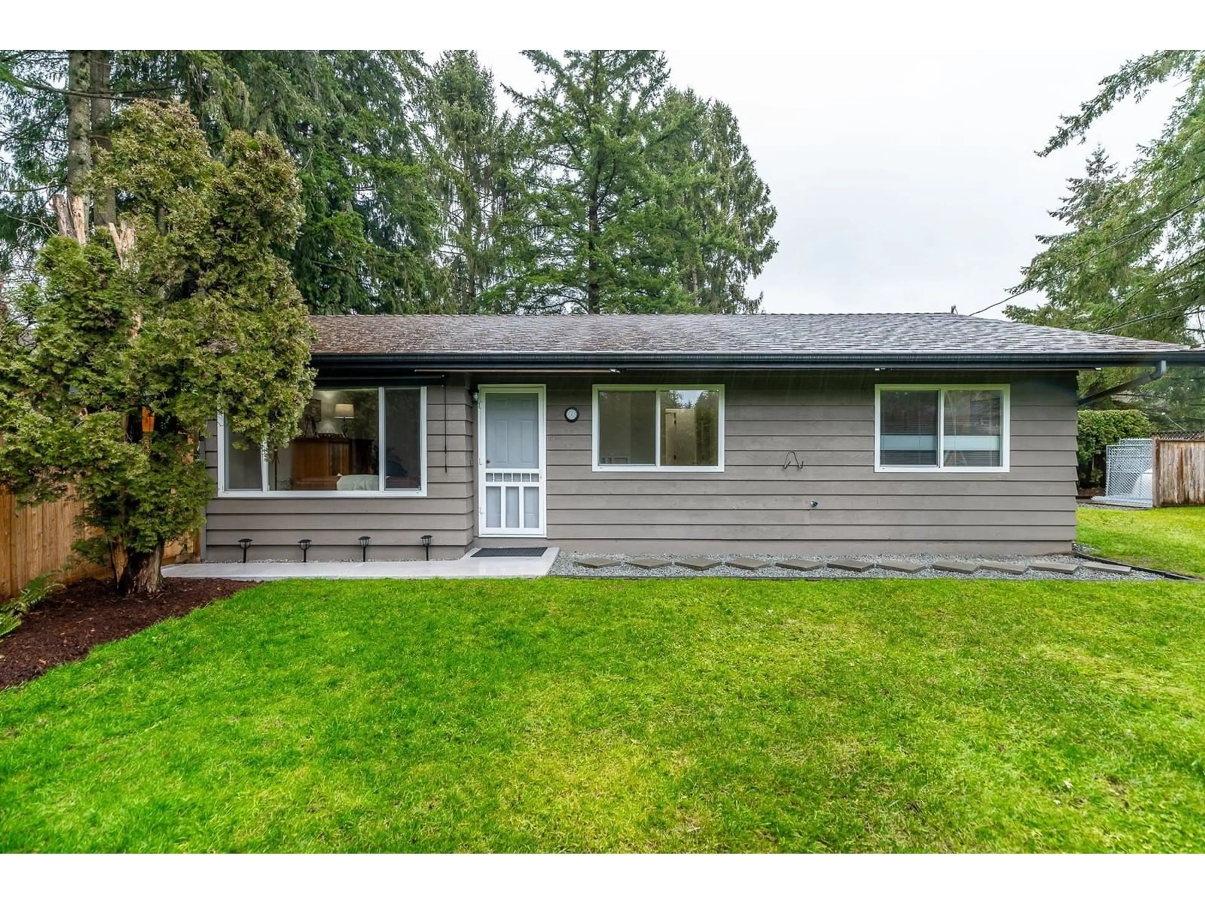 Home with vinyl exterior material, street for 4240 200, Langley British Columbia V3A1L1