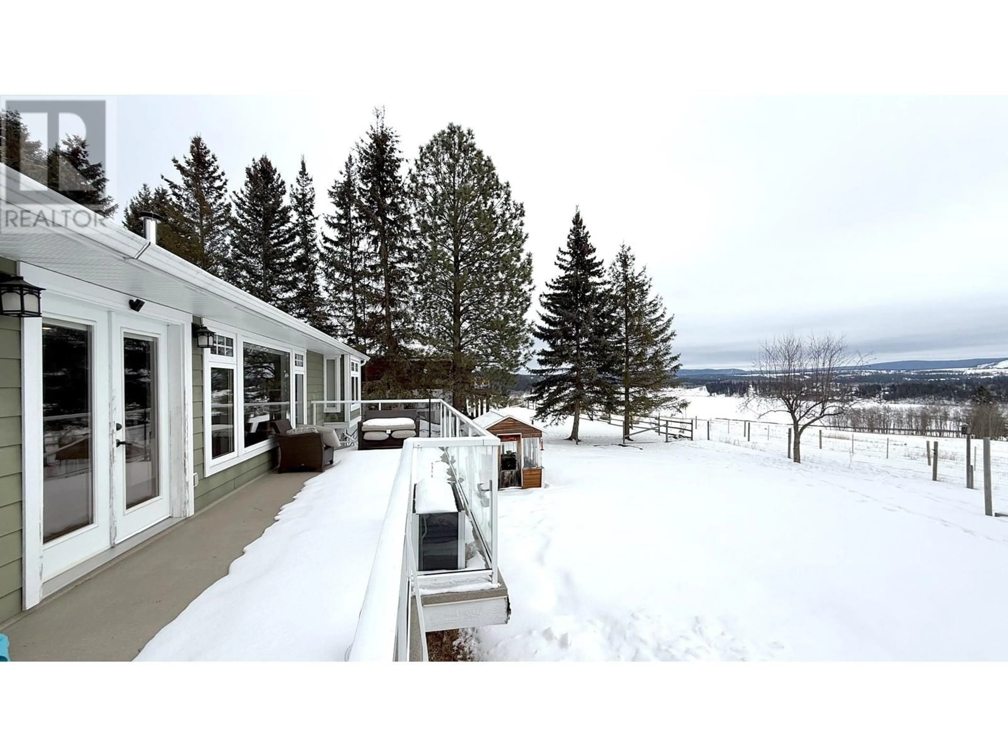 A pic from outside/outdoor area/front of a property/back of a property/a pic from drone, mountain view for 5450 DONSLEEQUA COURT, 108 Mile Ranch British Columbia V0K2Z0