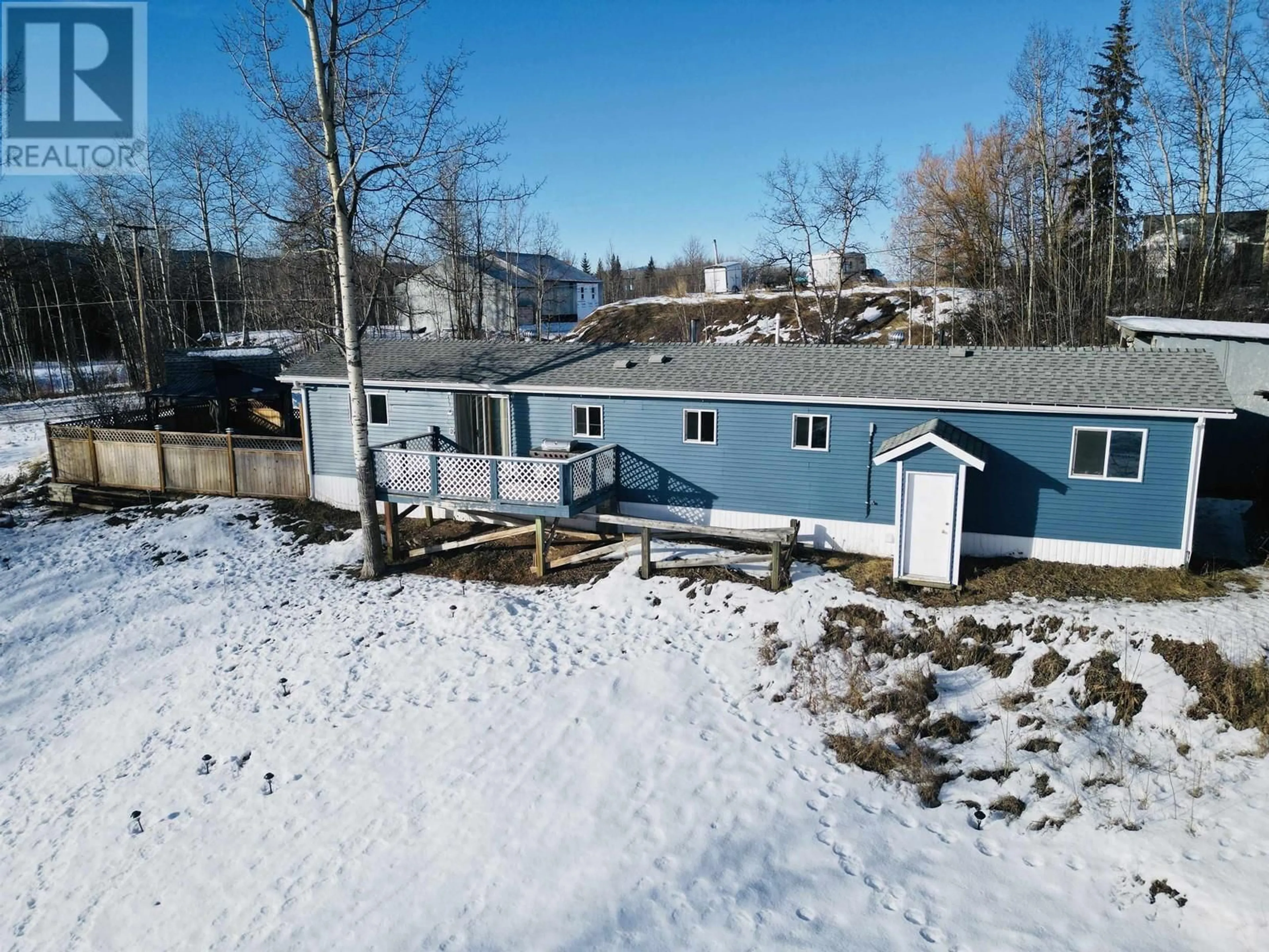 A pic from outside/outdoor area/front of a property/back of a property/a pic from drone, unknown for 991 W 16 HIGHWAY, Burns Lake British Columbia V0J1E1