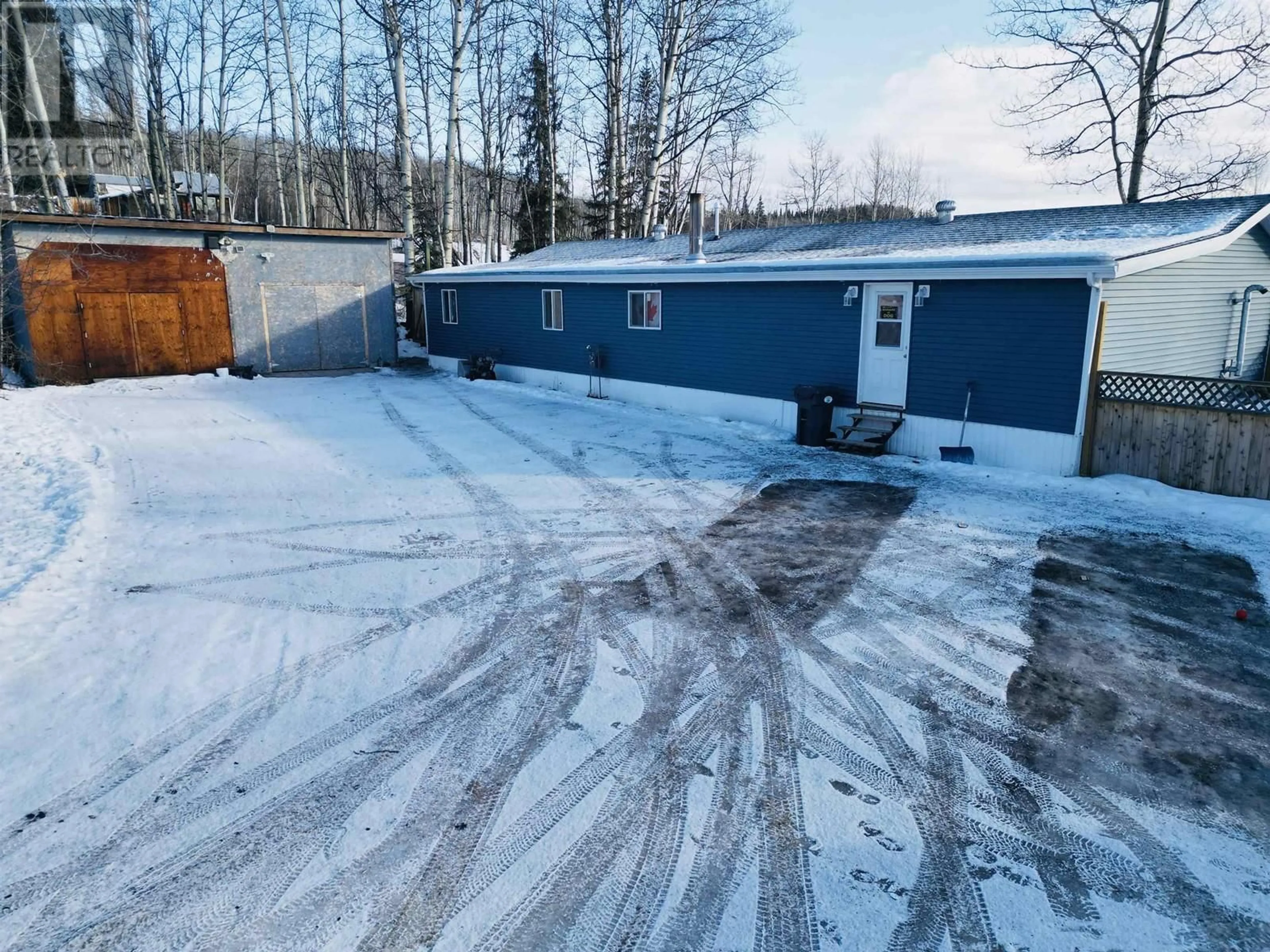 A pic from outside/outdoor area/front of a property/back of a property/a pic from drone, street for 991 W 16 HIGHWAY, Burns Lake British Columbia V0J1E1