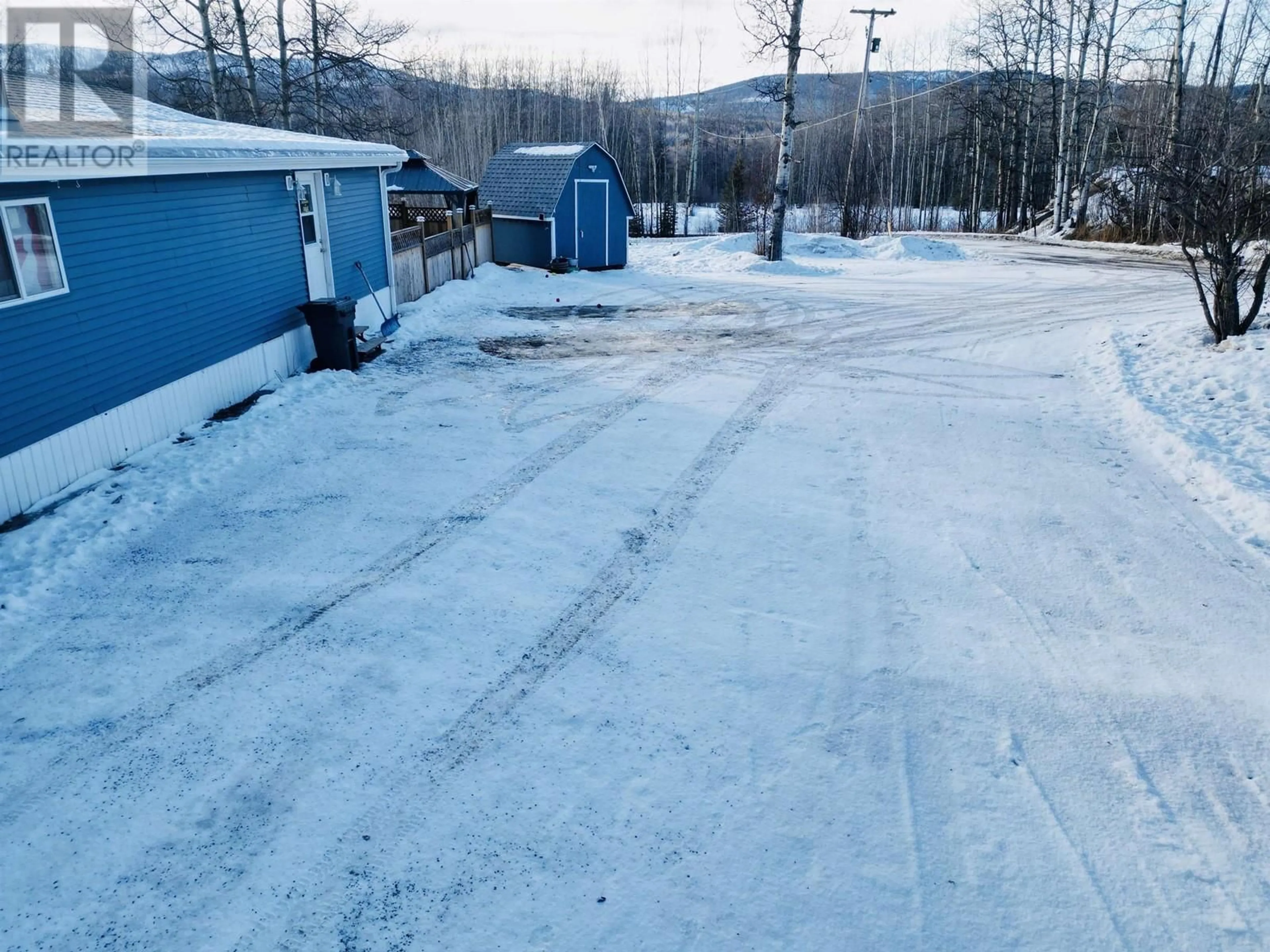 A pic from outside/outdoor area/front of a property/back of a property/a pic from drone, street for 991 W 16 HIGHWAY, Burns Lake British Columbia V0J1E1