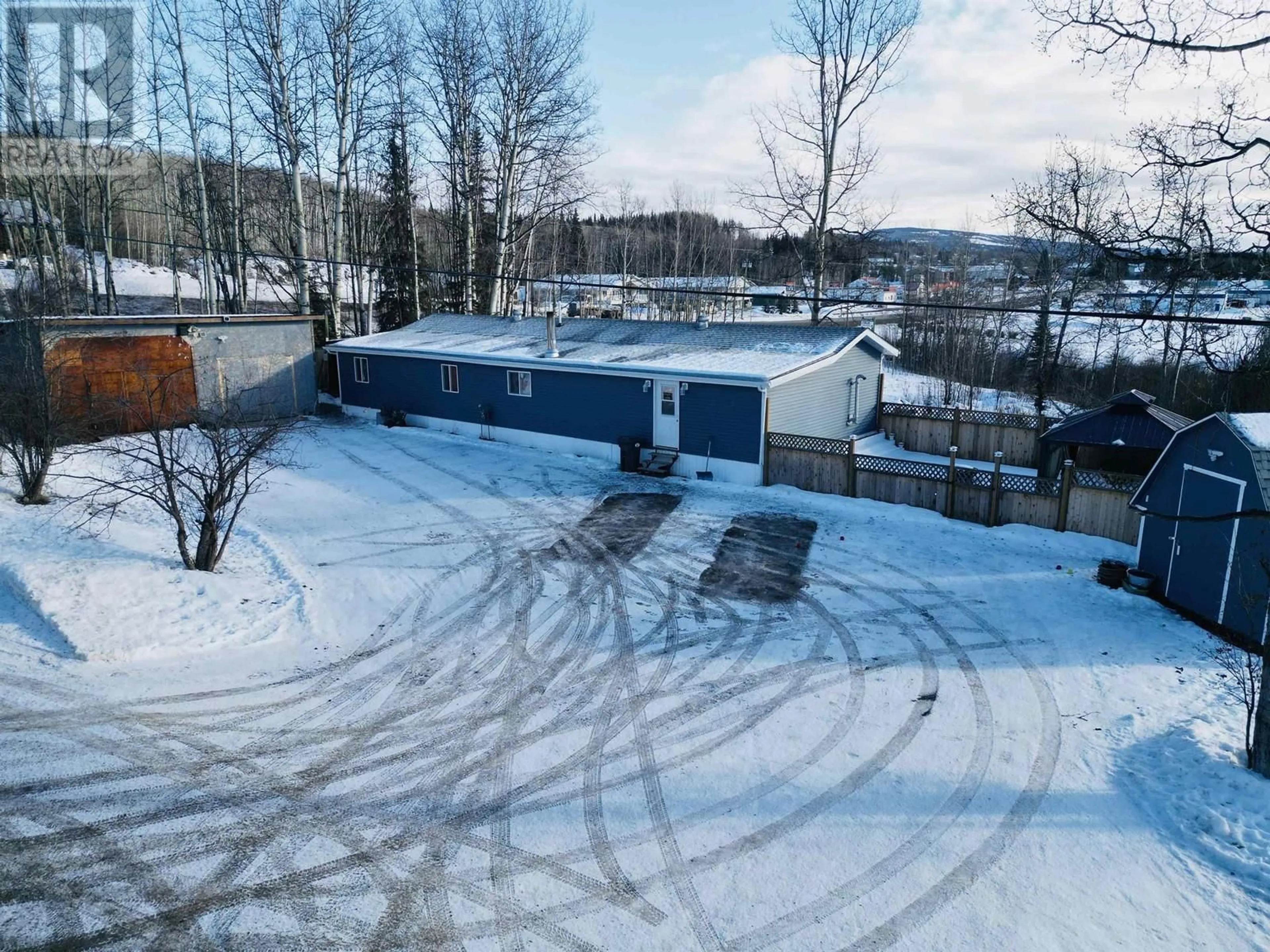 A pic from outside/outdoor area/front of a property/back of a property/a pic from drone, mountain view for 991 W 16 HIGHWAY, Burns Lake British Columbia V0J1E1