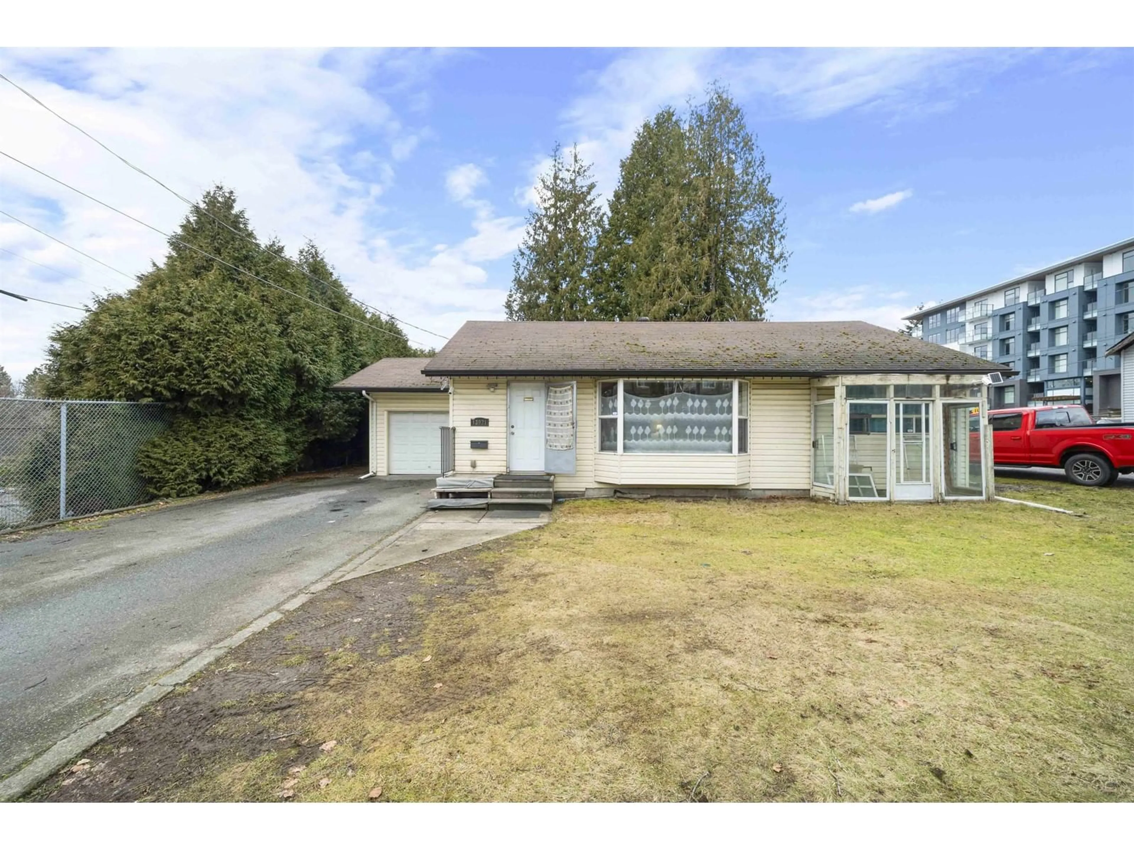 A pic from outside/outdoor area/front of a property/back of a property/a pic from drone, street for 13921 108 AVENUE, Surrey British Columbia V3T2L1