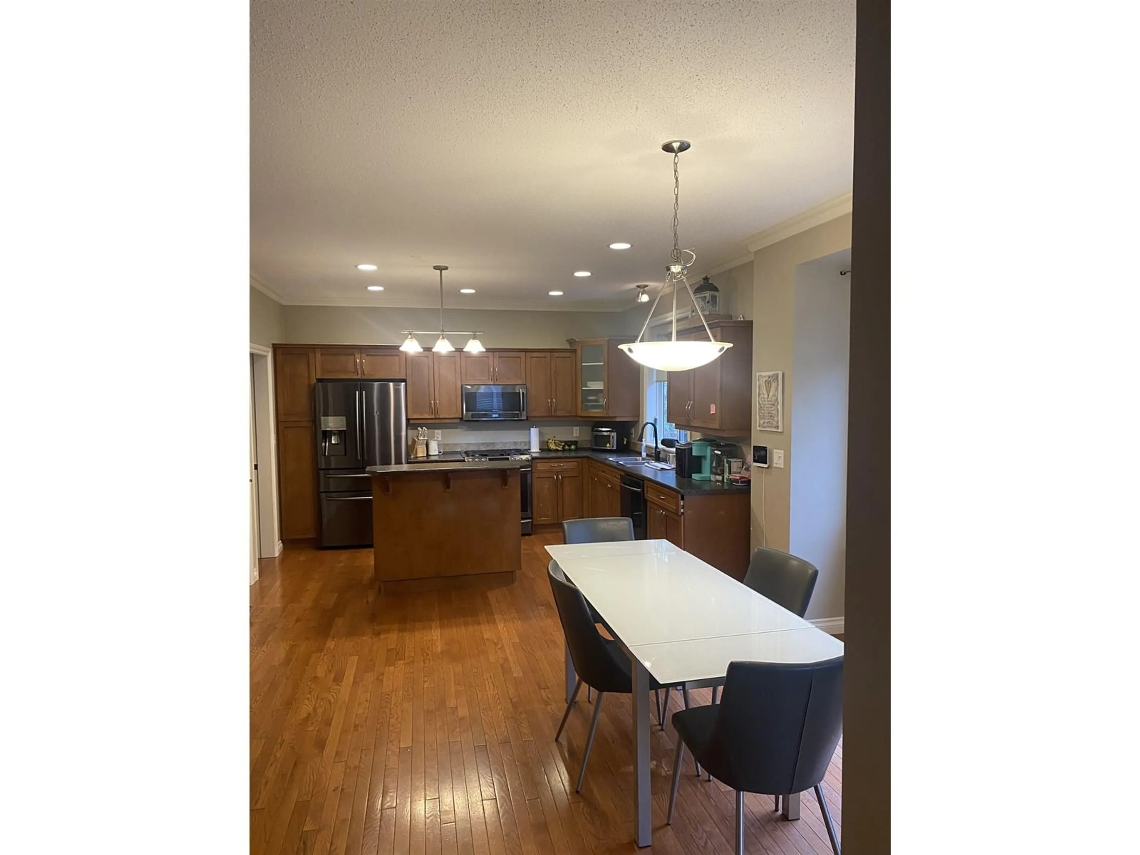 Open concept kitchen, wood/laminate floor for 5583 THOM CREEK DRIVE, Chilliwack British Columbia V2R5Z6