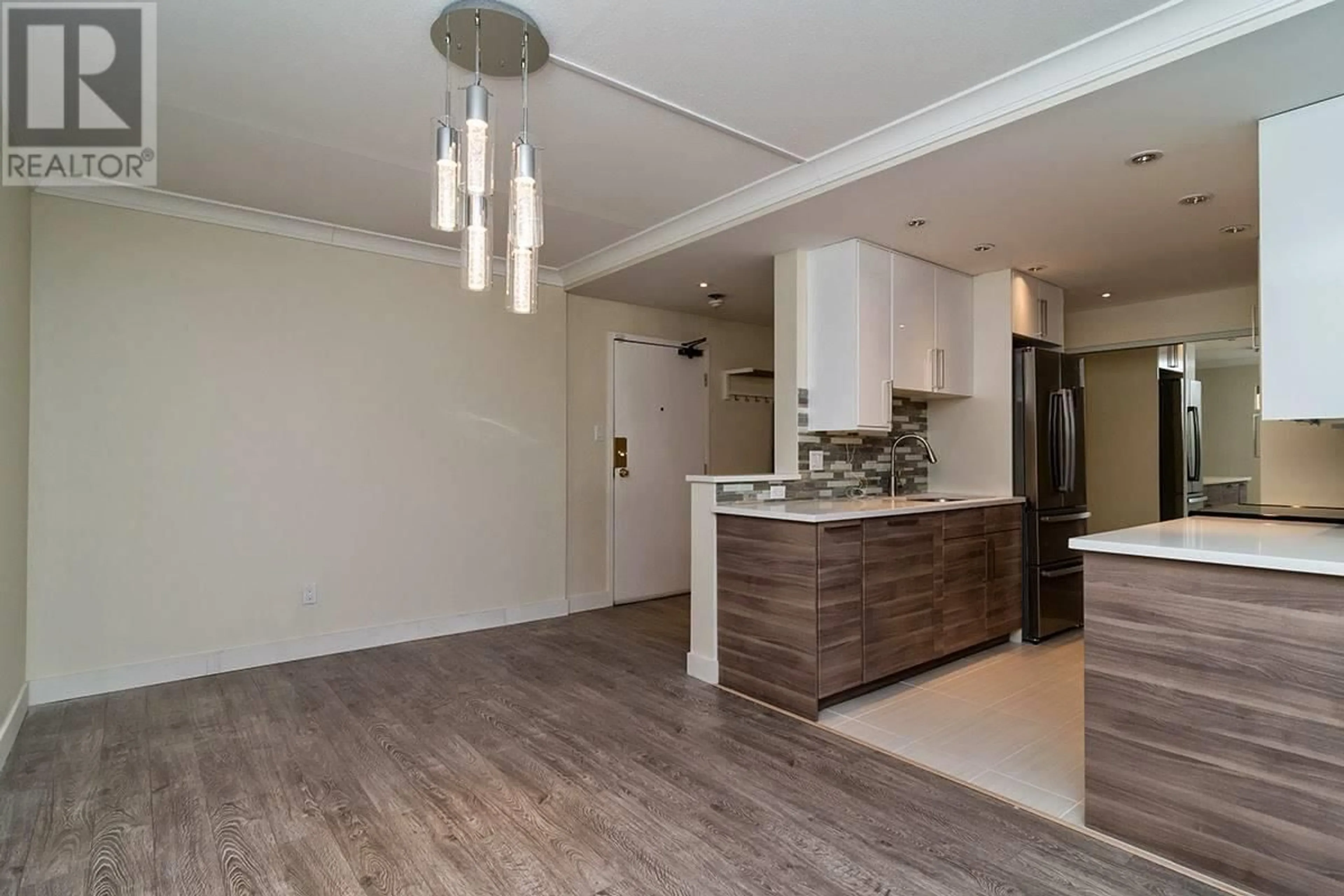 Open concept kitchen, wood/laminate floor for 1801 4134 MAYWOOD STREET, Burnaby British Columbia V5H4C9