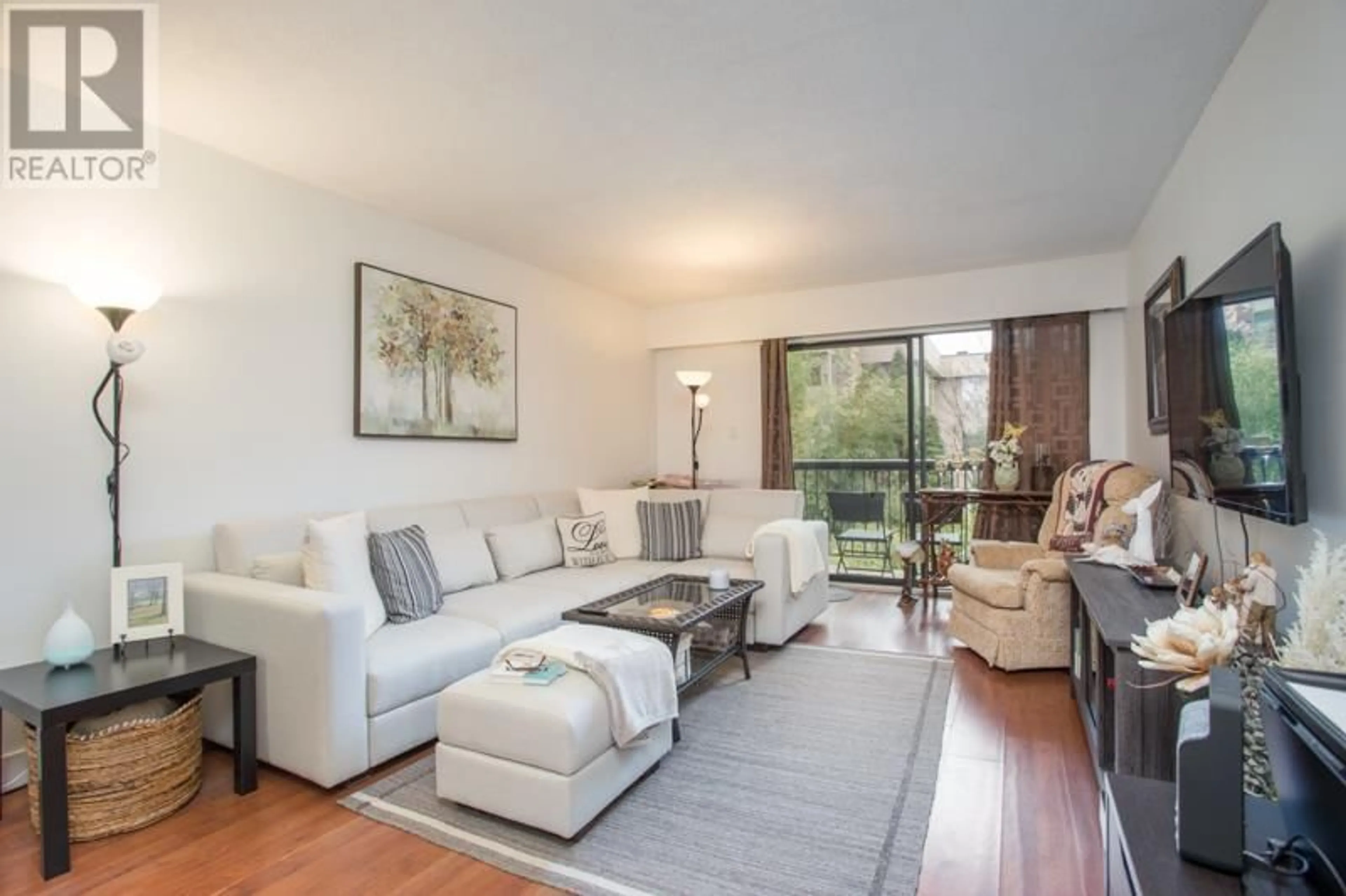 Living room with furniture, wood/laminate floor for 340 1844 W 7TH AVENUE, Vancouver British Columbia V6J1S8