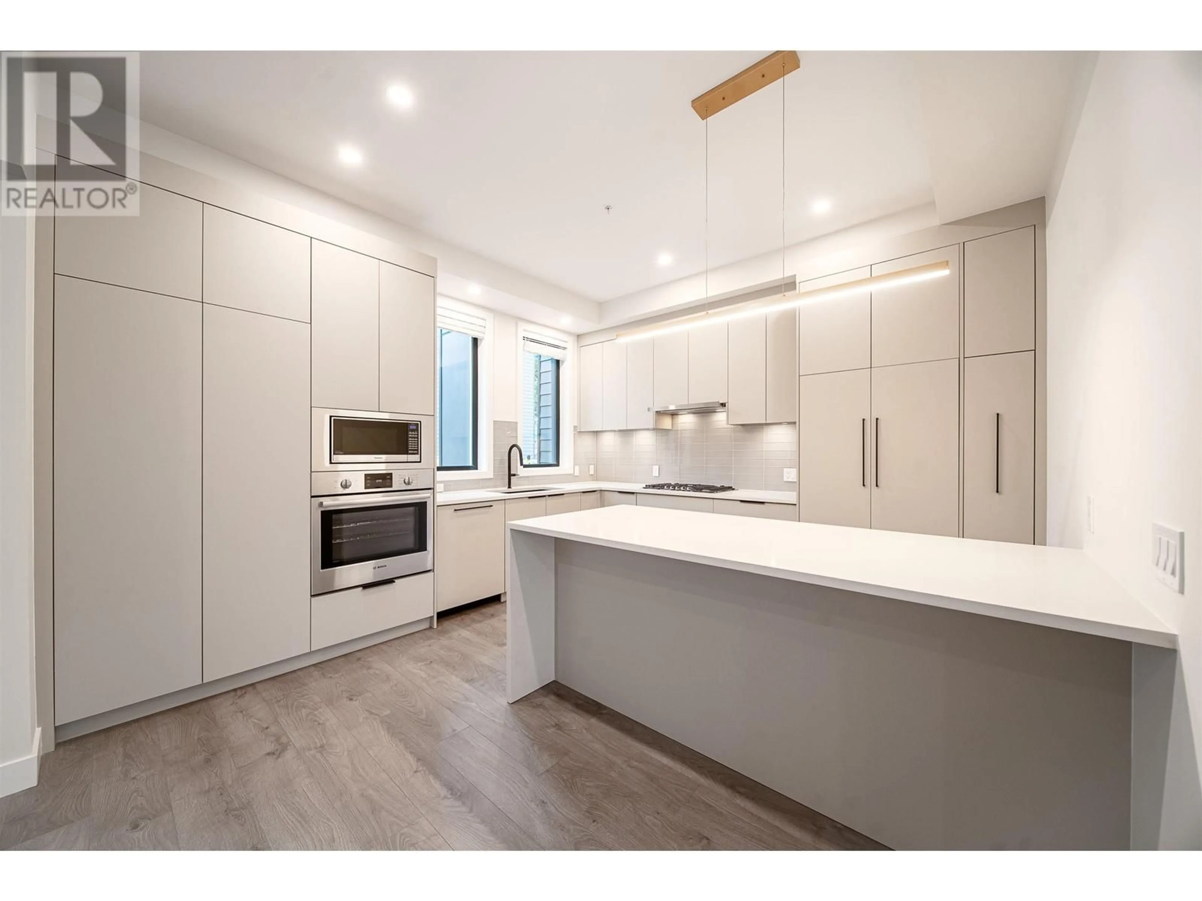Open concept kitchen, wood/laminate floor for 218 - 8699 SPIRES ROAD, Richmond British Columbia V6Y1W4