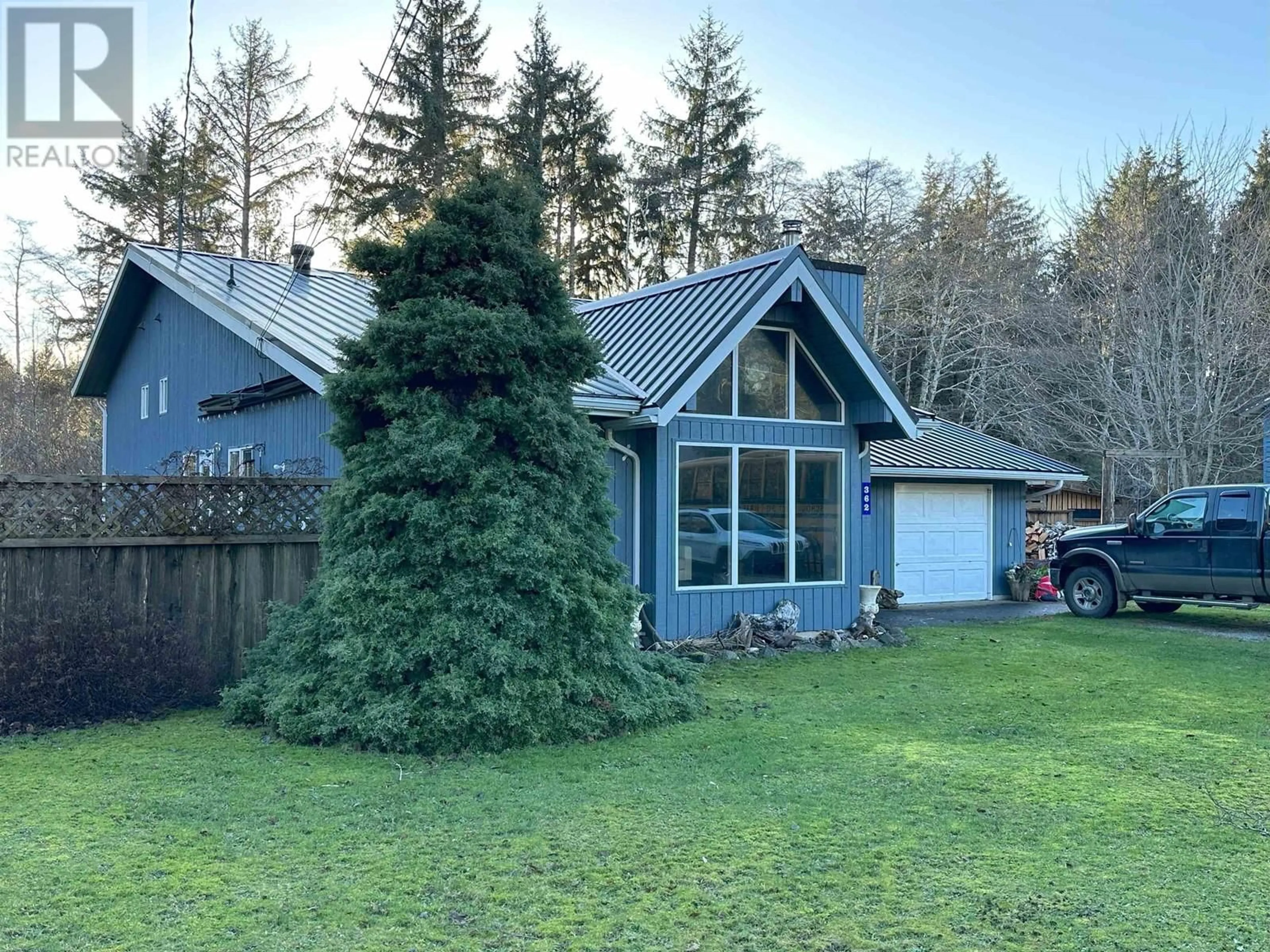 A pic from outside/outdoor area/front of a property/back of a property/a pic from drone, forest/trees view for 362 CHRISTINA PLACE, Skidegate/Sandspit British Columbia V0T1T0