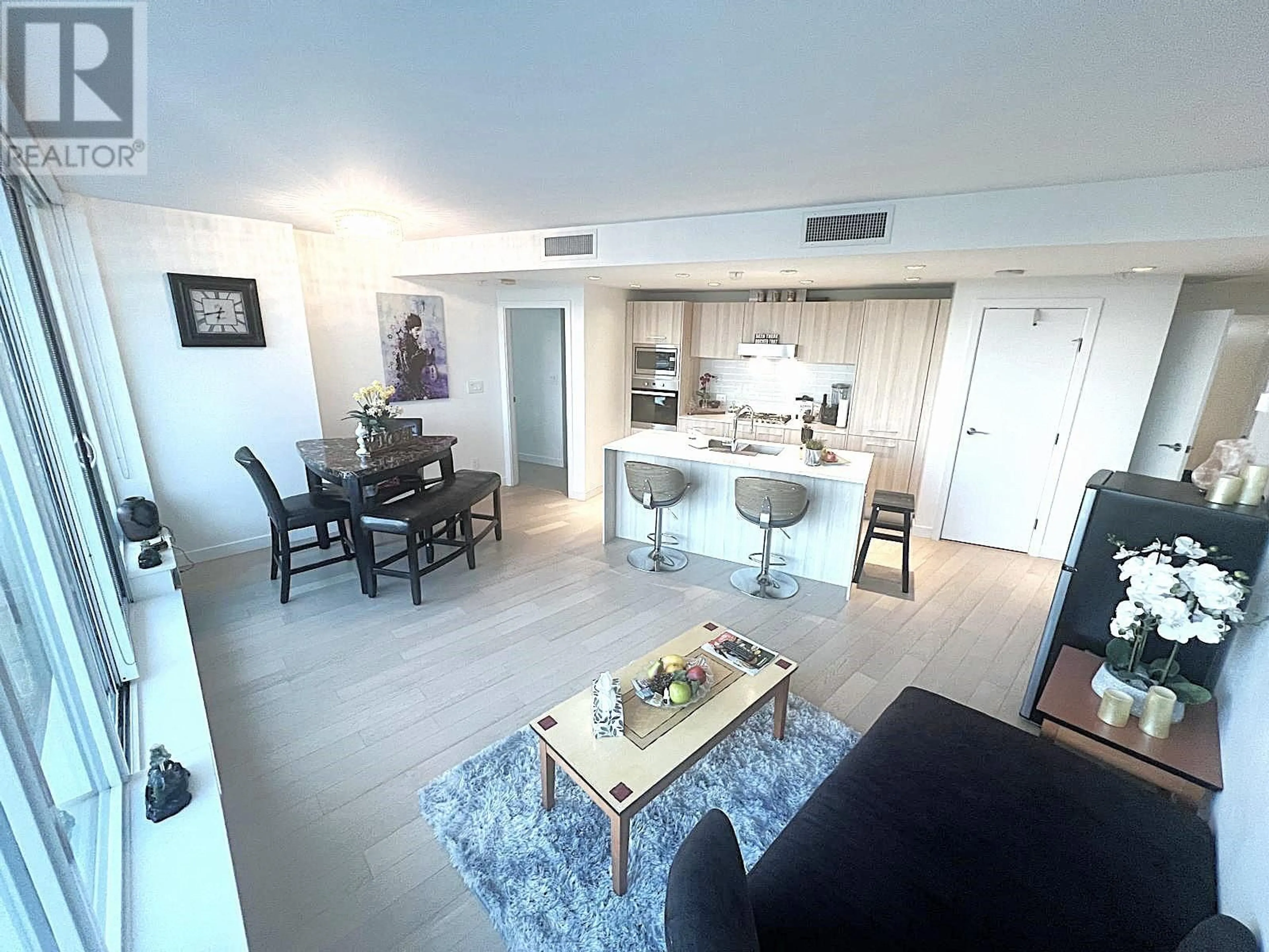 Living room with furniture, unknown for 809 - 4638 GLADSTONE STREET, Vancouver British Columbia V5N0G5