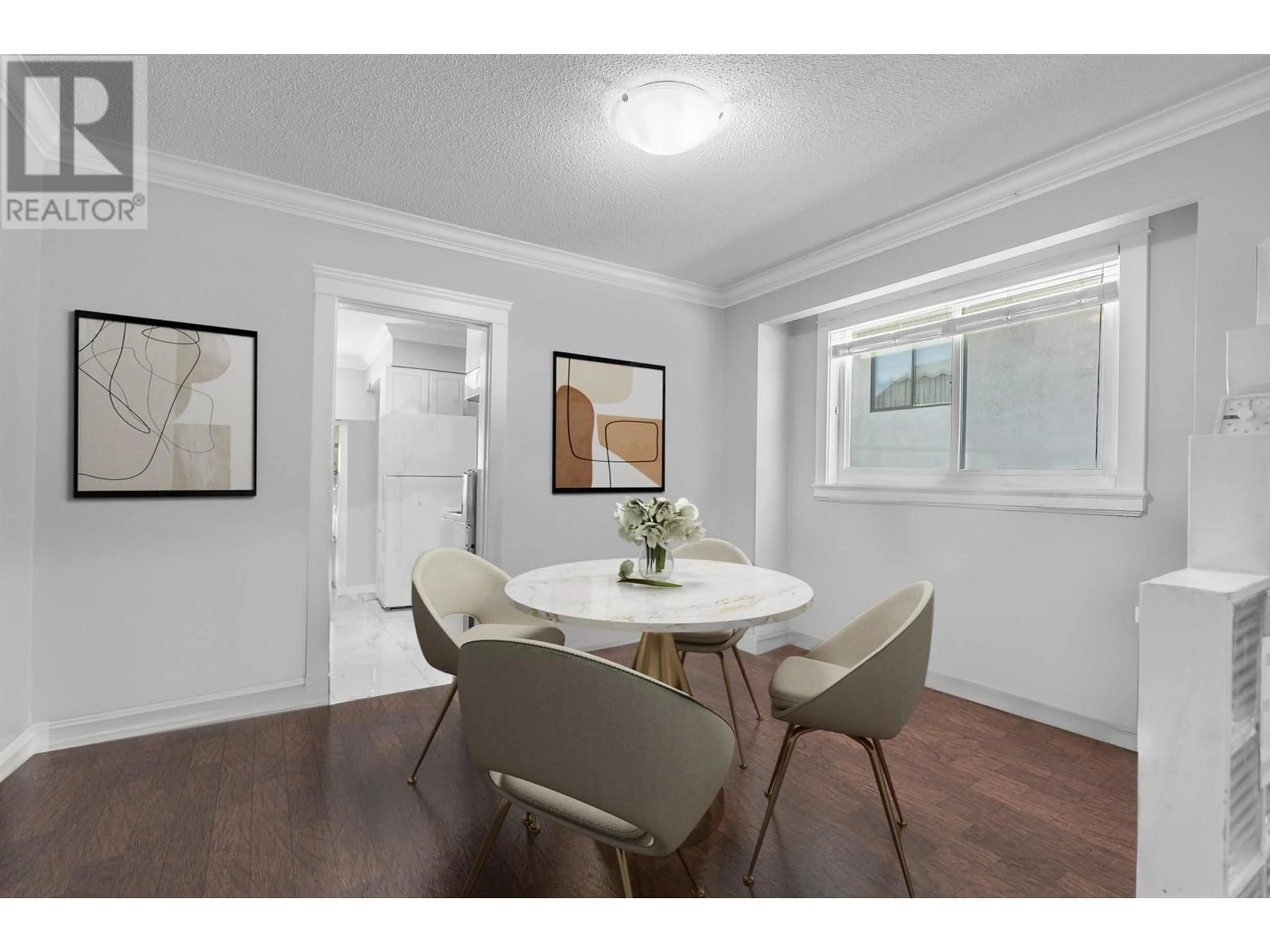 Dining room, wood/laminate floor for 6394 CHESTER STREET, Vancouver British Columbia V5W3C3