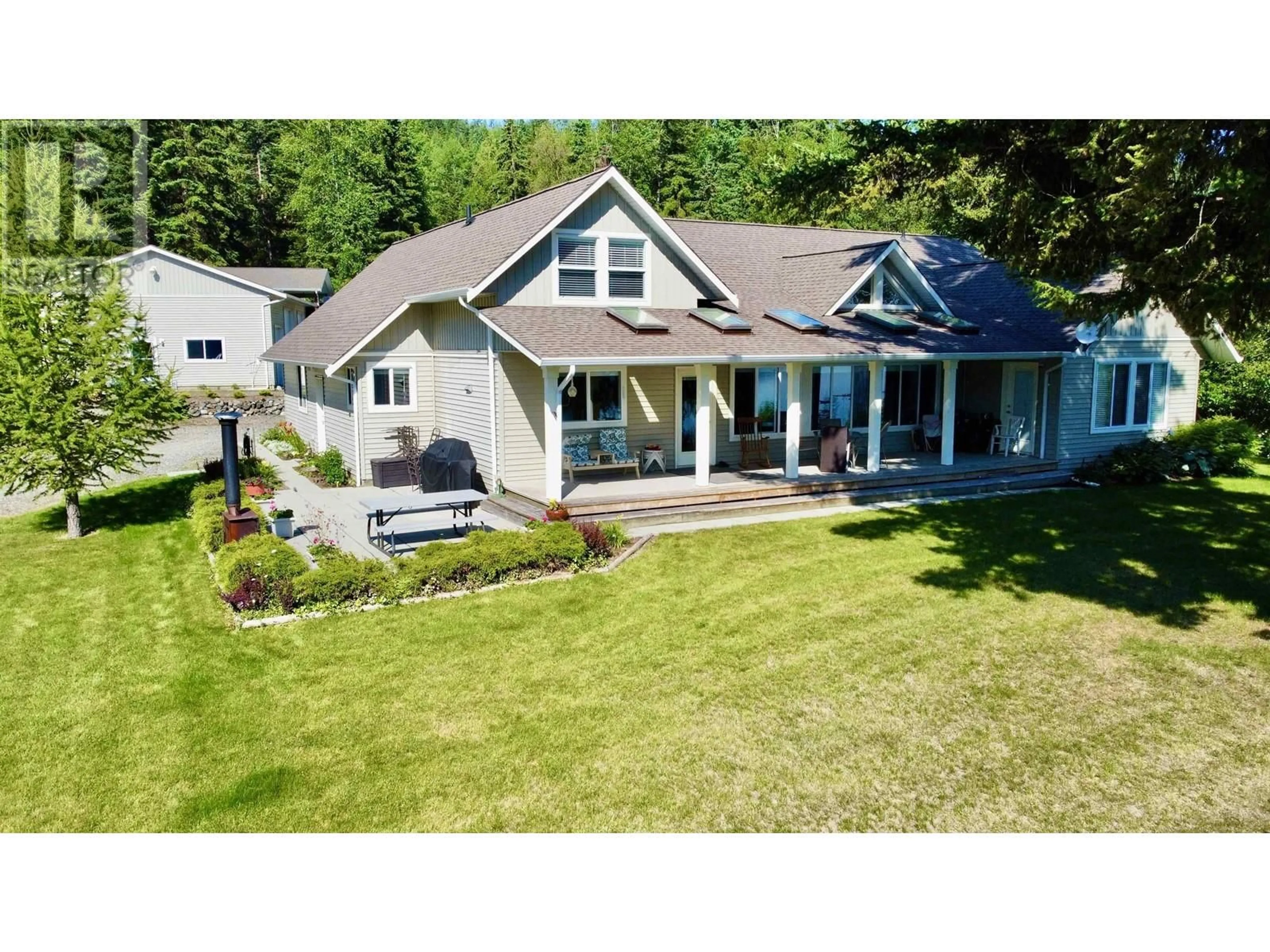 A pic from outside/outdoor area/front of a property/back of a property/a pic from drone, water/lake/river/ocean view for 4143 BLUEBIRD ROAD, Canim Lake British Columbia V0K1J0