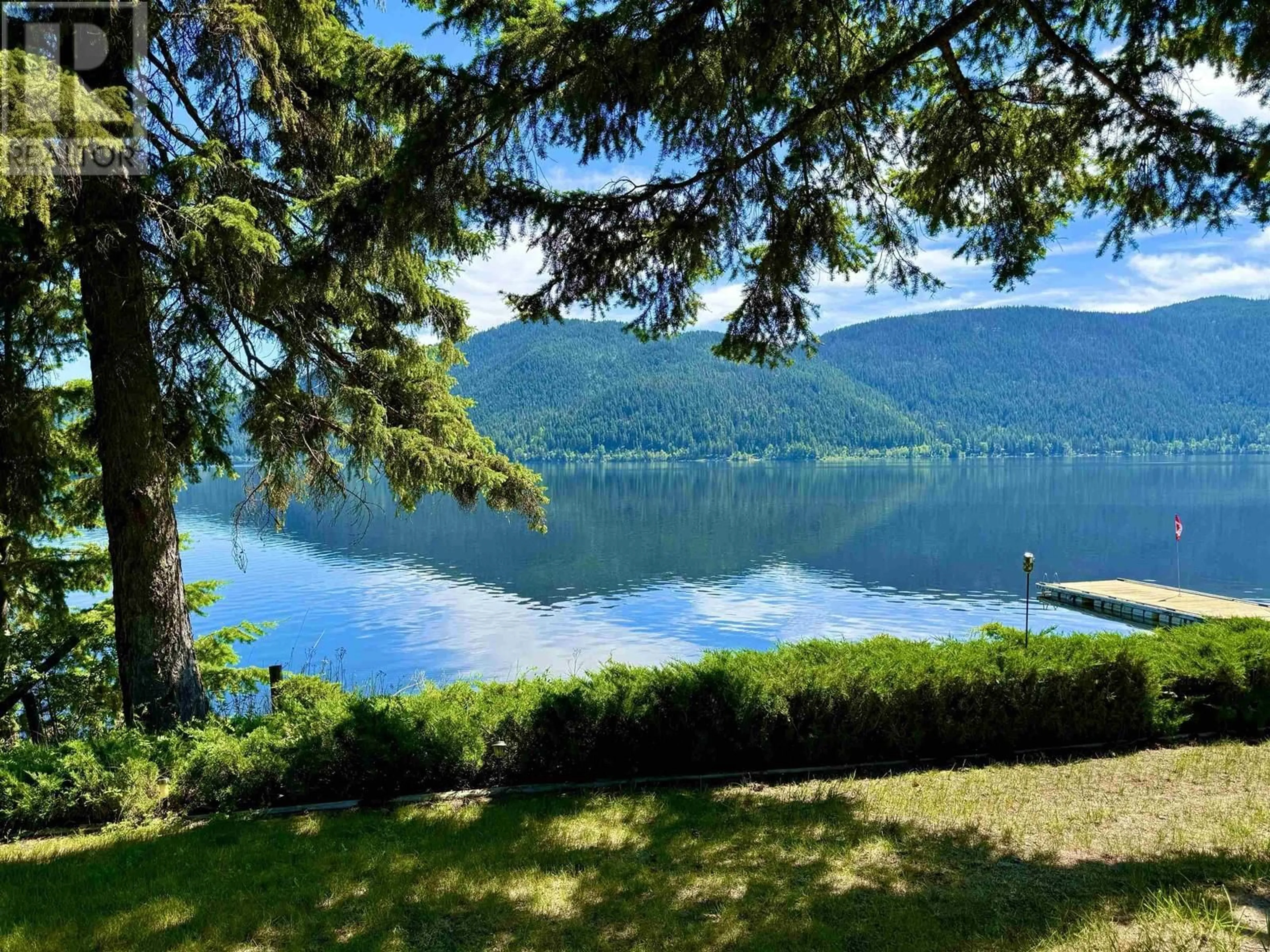 A pic from outside/outdoor area/front of a property/back of a property/a pic from drone, water/lake/river/ocean view for 4143 BLUEBIRD ROAD, Canim Lake British Columbia V0K1J0