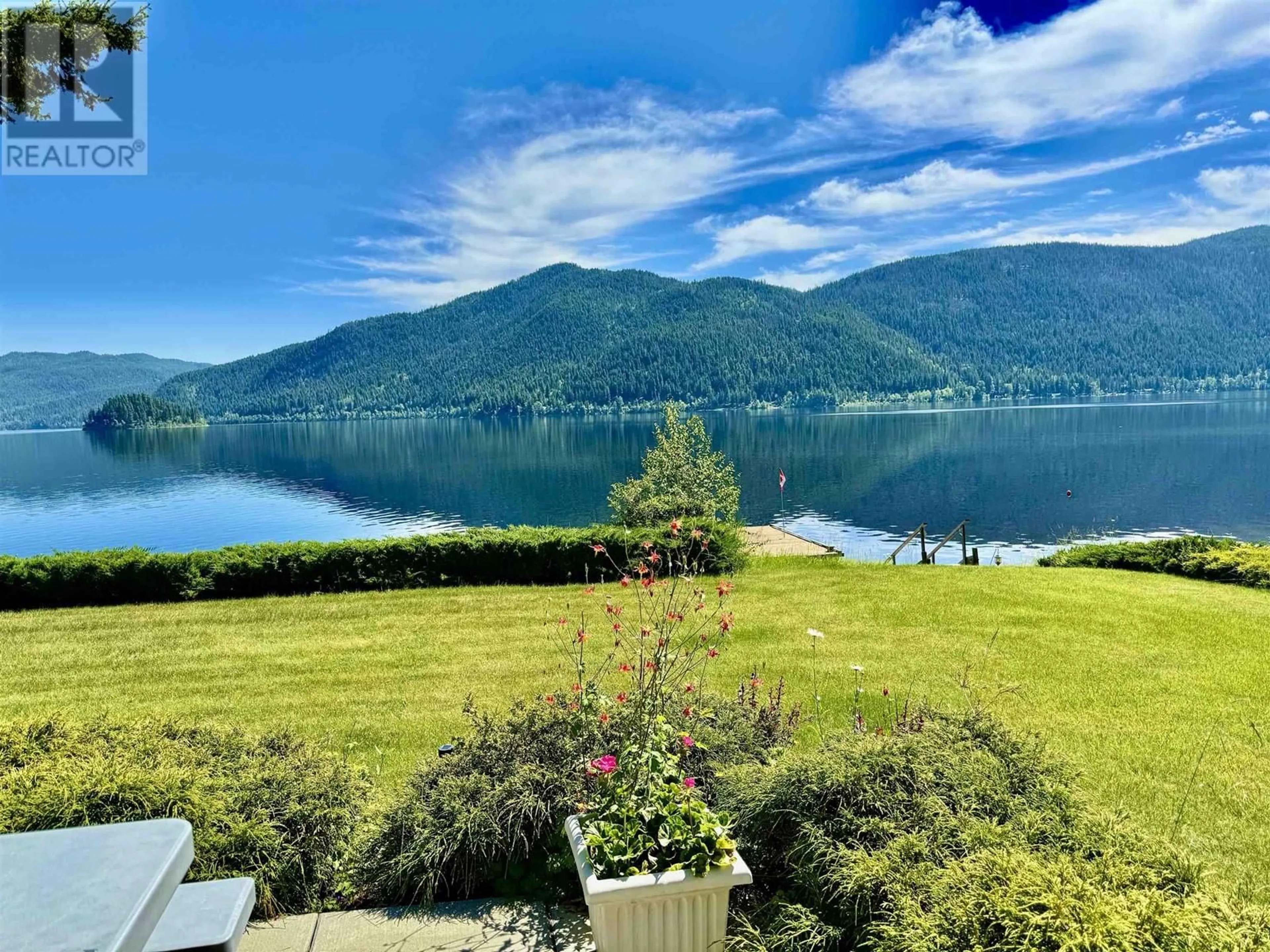 A pic from outside/outdoor area/front of a property/back of a property/a pic from drone, water/lake/river/ocean view for 4143 BLUEBIRD ROAD, Canim Lake British Columbia V0K1J0