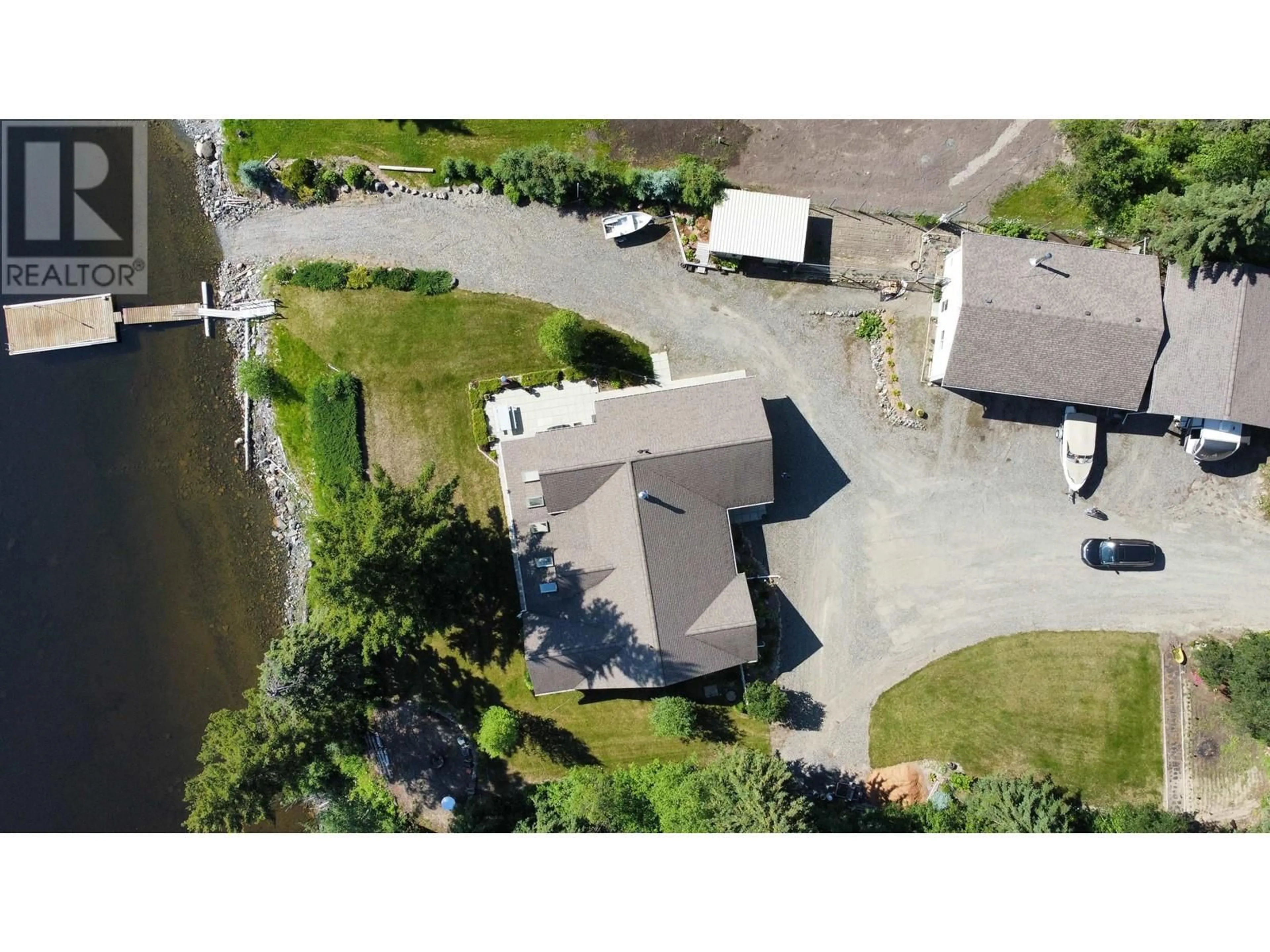 A pic from outside/outdoor area/front of a property/back of a property/a pic from drone, water/lake/river/ocean view for 4143 BLUEBIRD ROAD, Canim Lake British Columbia V0K1J0