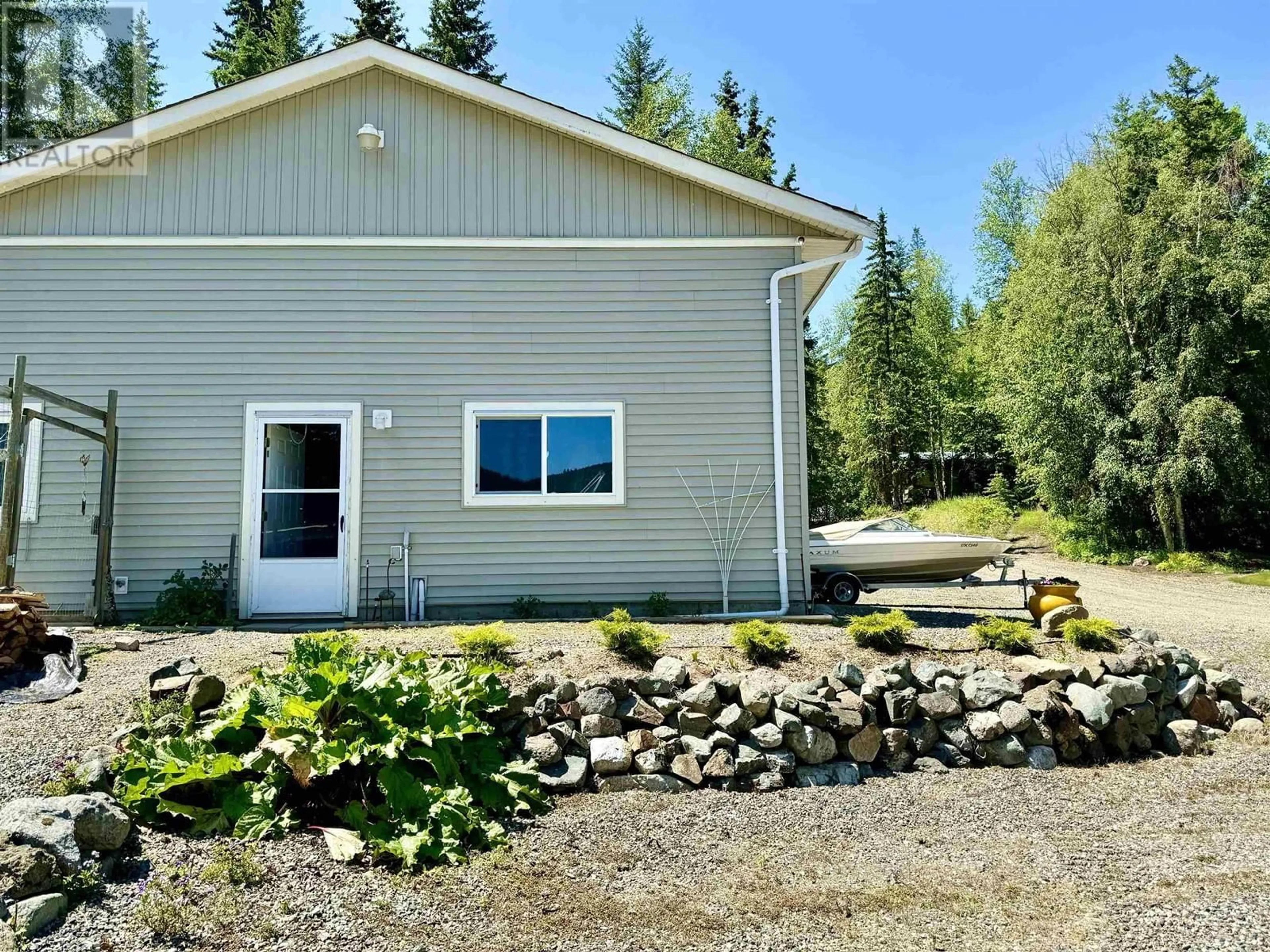 A pic from outside/outdoor area/front of a property/back of a property/a pic from drone, unknown for 4143 BLUEBIRD ROAD, Canim Lake British Columbia V0K1J0