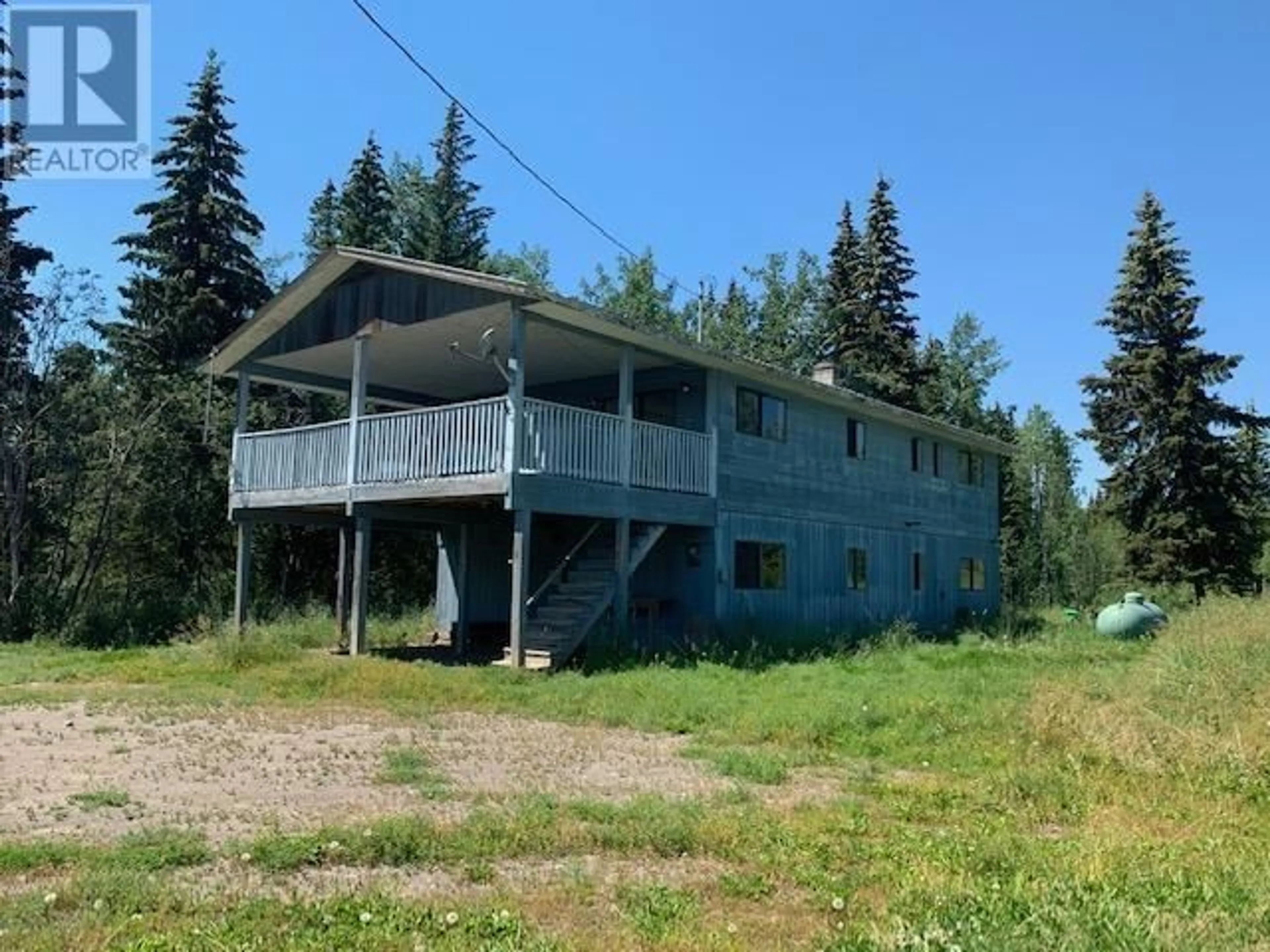 A pic from outside/outdoor area/front of a property/back of a property/a pic from drone, building for 7506 MAGNUSSEN ROAD, 100 Mile House British Columbia V0K1X1