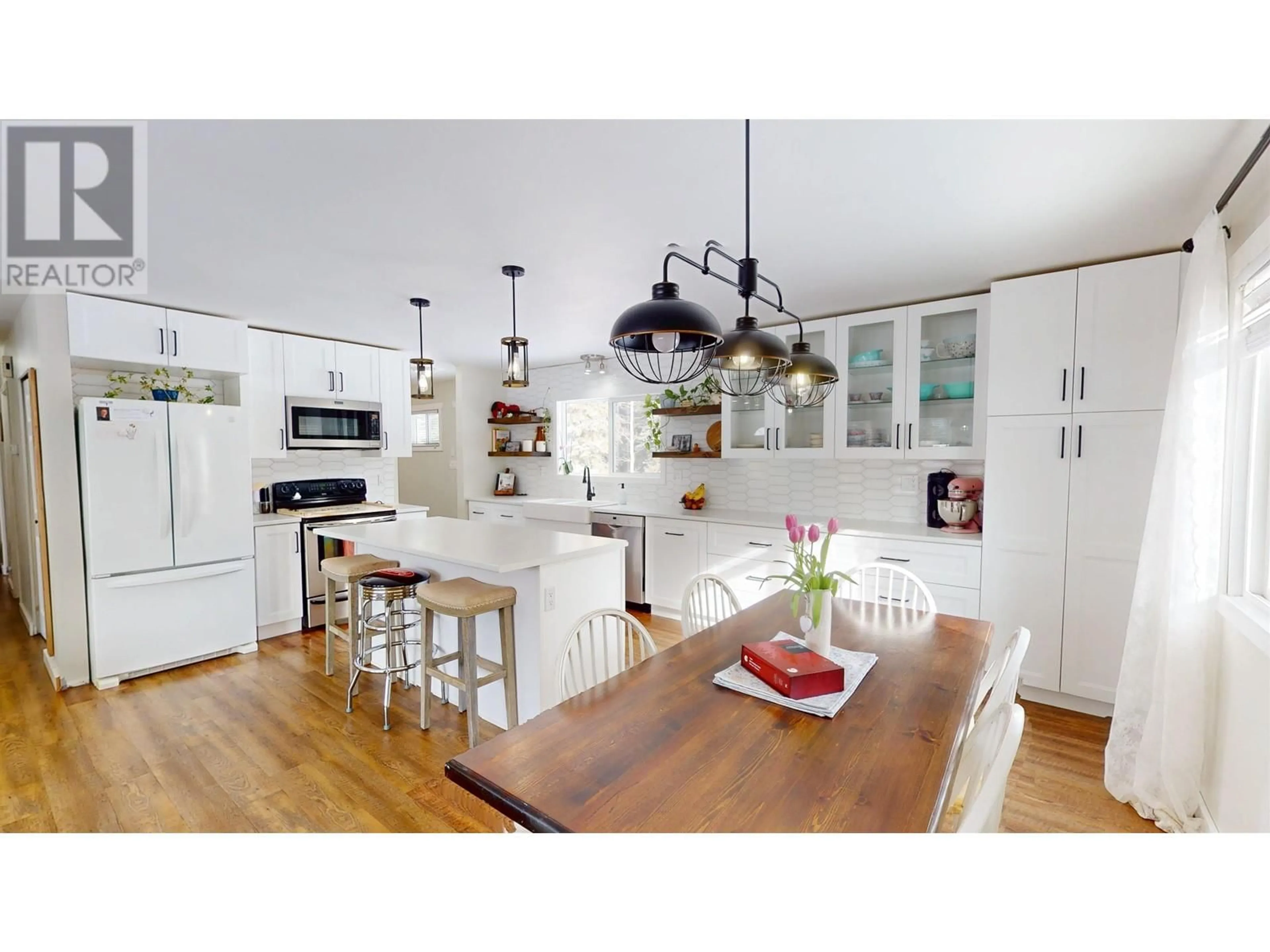 Open concept kitchen, wood/laminate floor for 2340 OMINECA PLACE, Houston British Columbia V0J1Z2