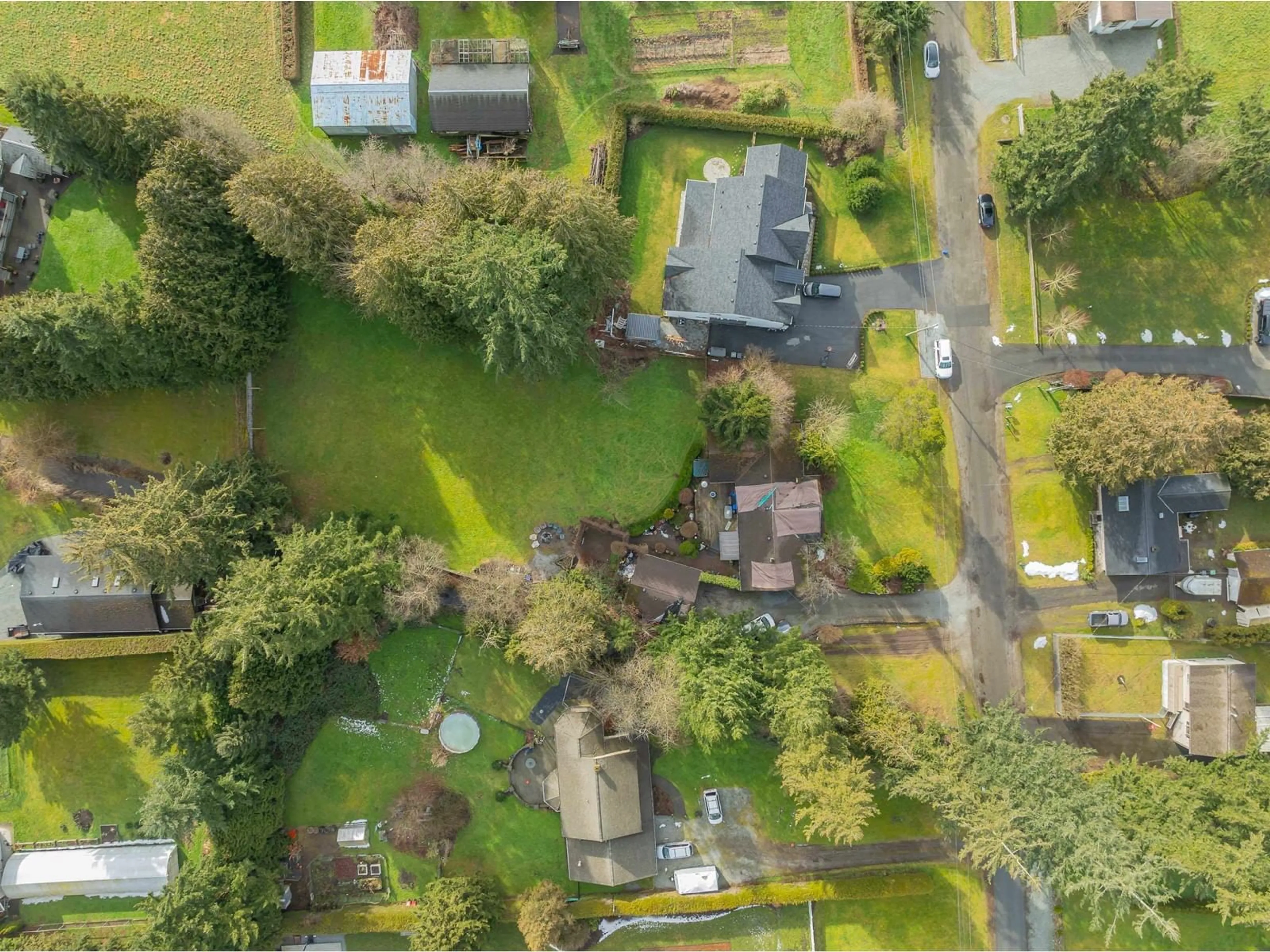 A pic from outside/outdoor area/front of a property/back of a property/a pic from drone, street for 4602 238 STREET, Langley British Columbia V2Z2S9