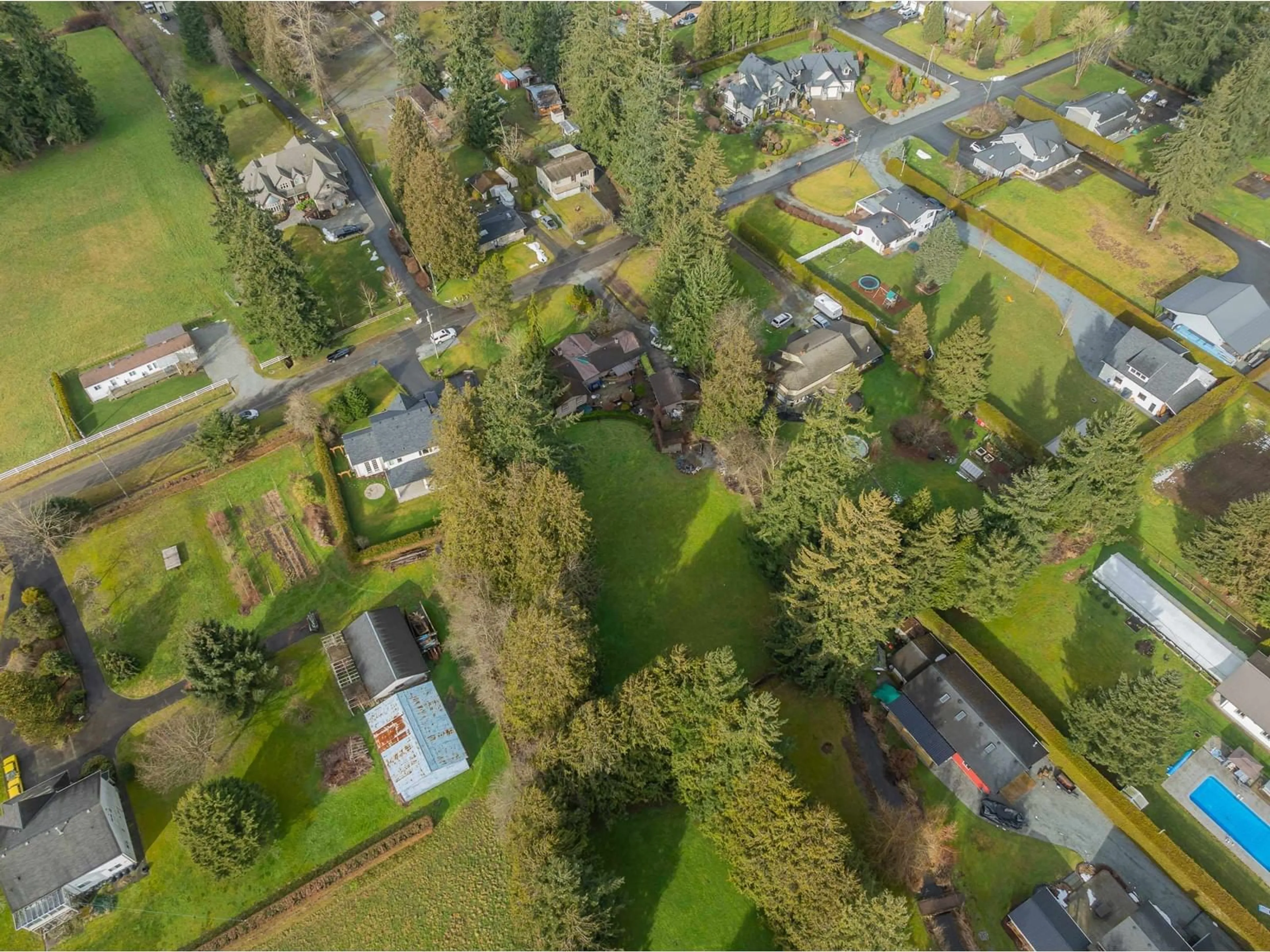 A pic from outside/outdoor area/front of a property/back of a property/a pic from drone, street for 4602 238 STREET, Langley British Columbia V2Z2S9