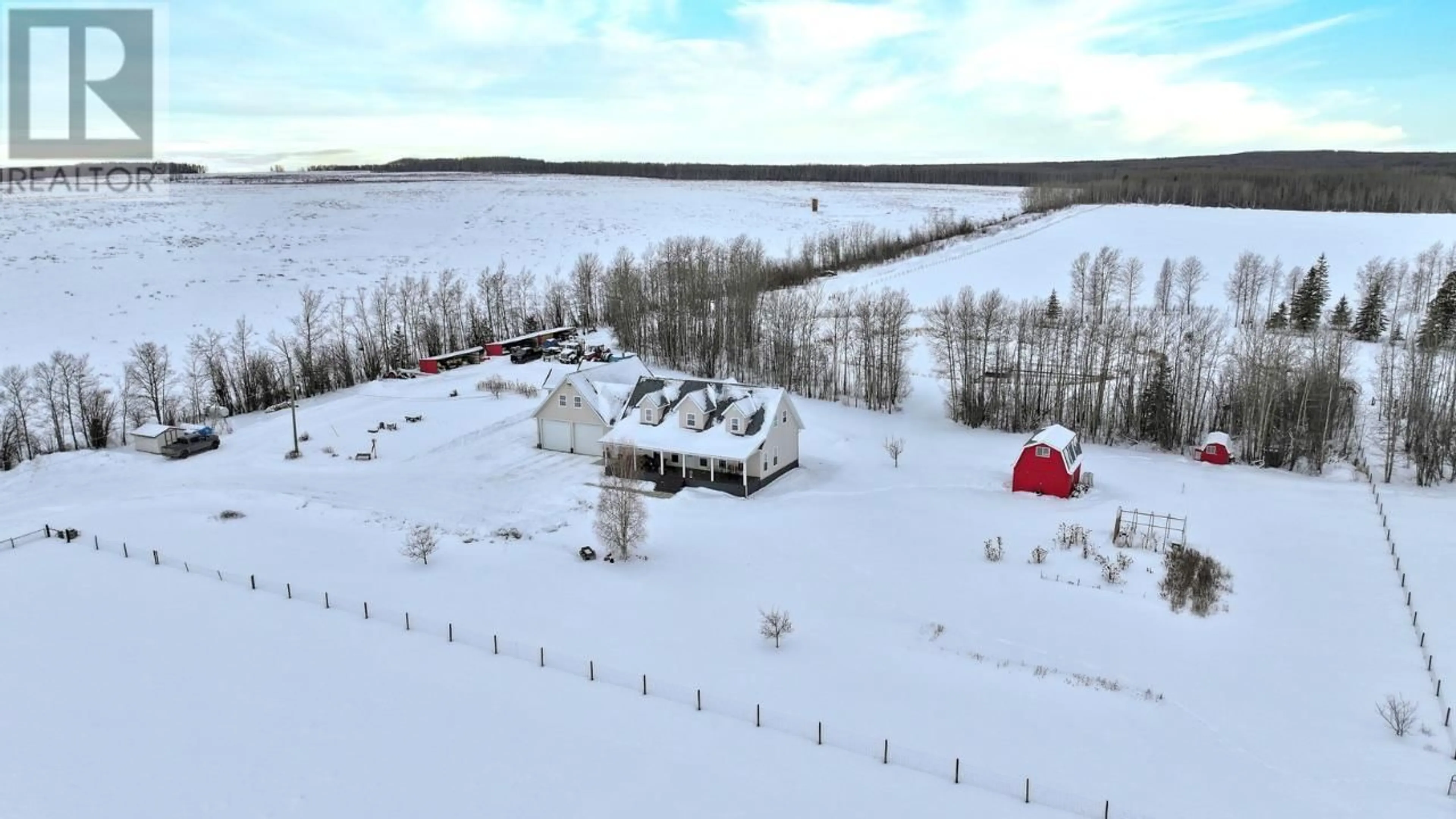 A pic from outside/outdoor area/front of a property/back of a property/a pic from drone, mountain view for 20110 GARCIA STREET, Fort St. John British Columbia V0C2R0