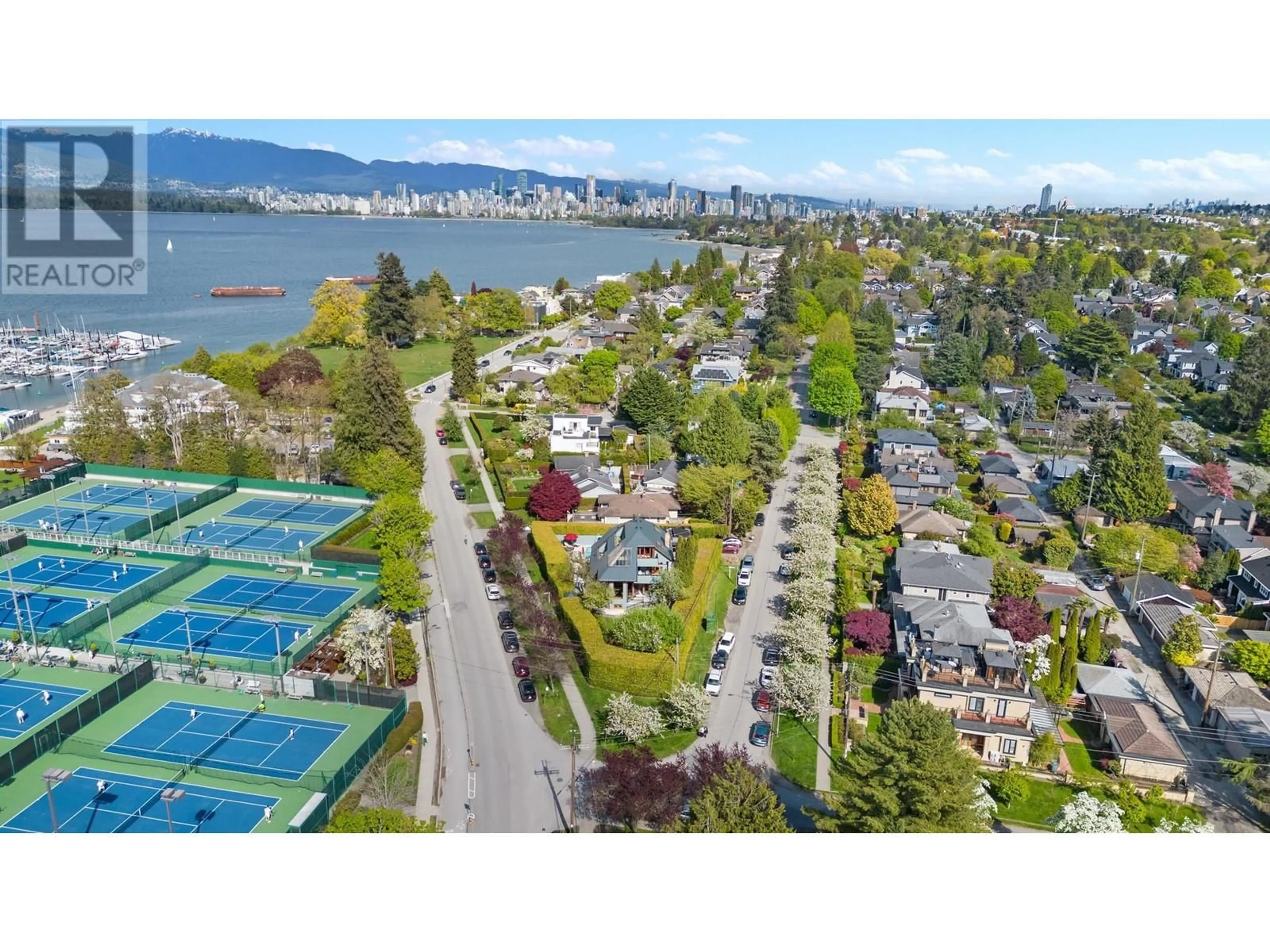 A pic from outside/outdoor area/front of a property/back of a property/a pic from drone, water/lake/river/ocean view for 3850 POINT GREY ROAD, Vancouver British Columbia V6R1B4