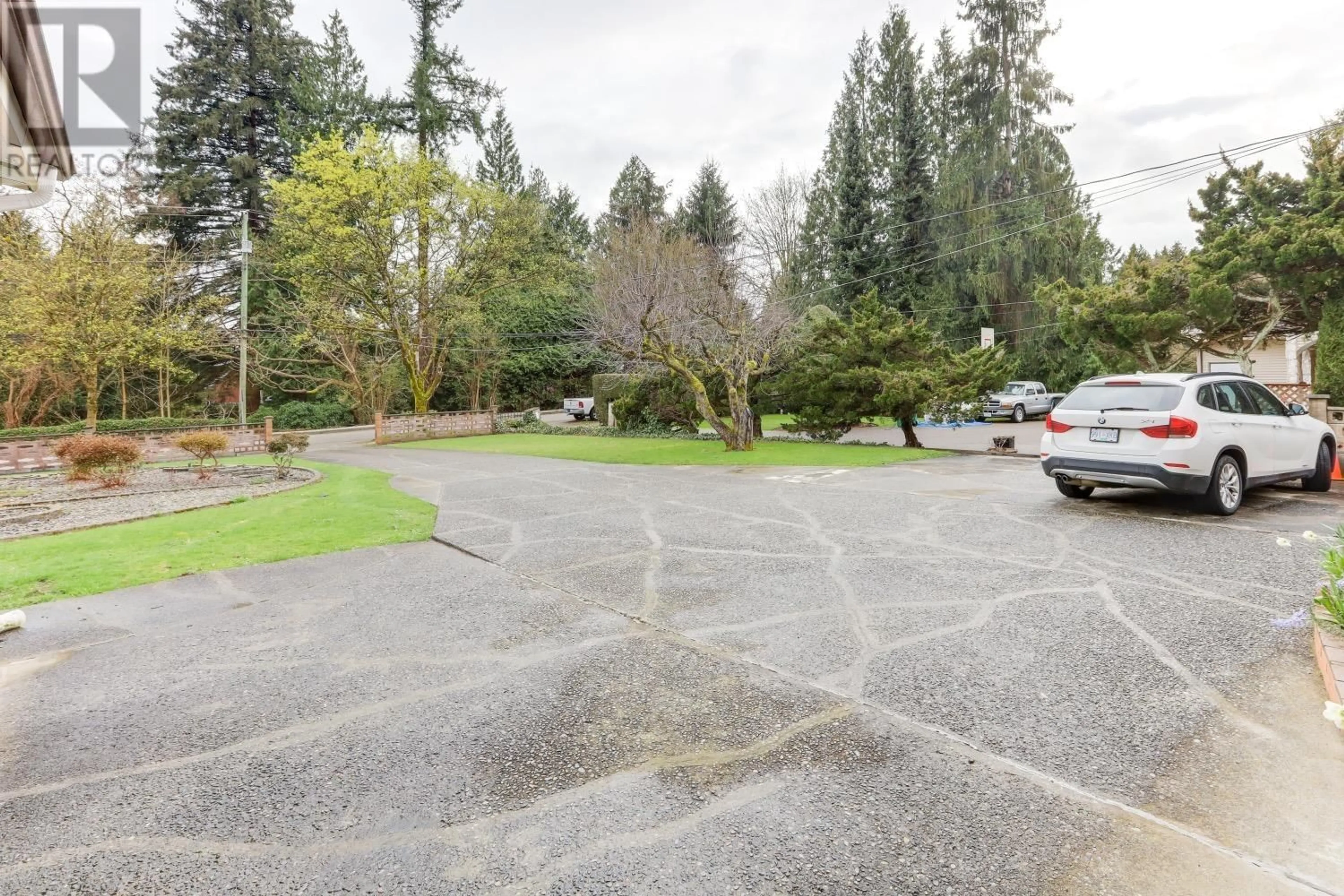 A pic from outside/outdoor area/front of a property/back of a property/a pic from drone, street for 7765 GOVERNMENT ROAD, Burnaby British Columbia V5A2C7