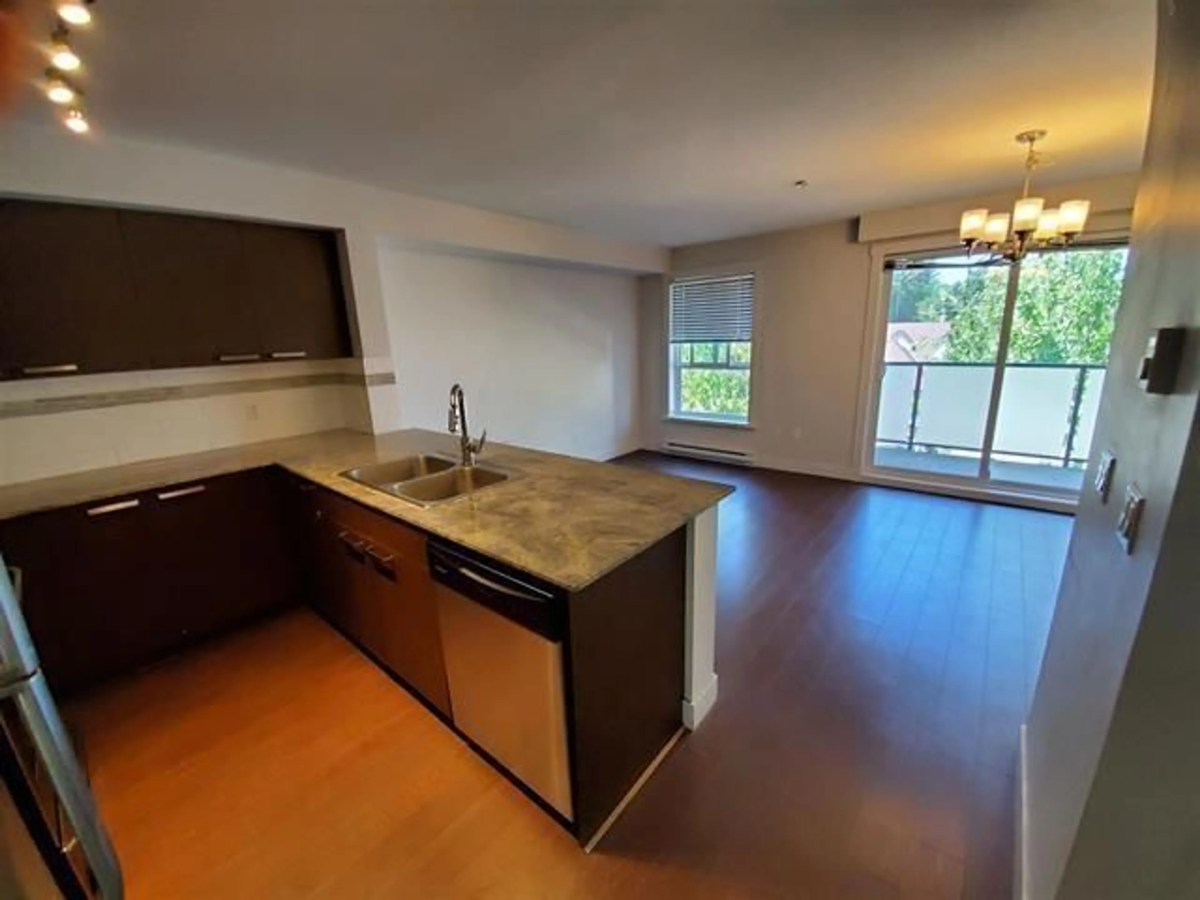 Open concept kitchen, unknown for 315 - 13883 LAUREL, Surrey British Columbia V3T1A8