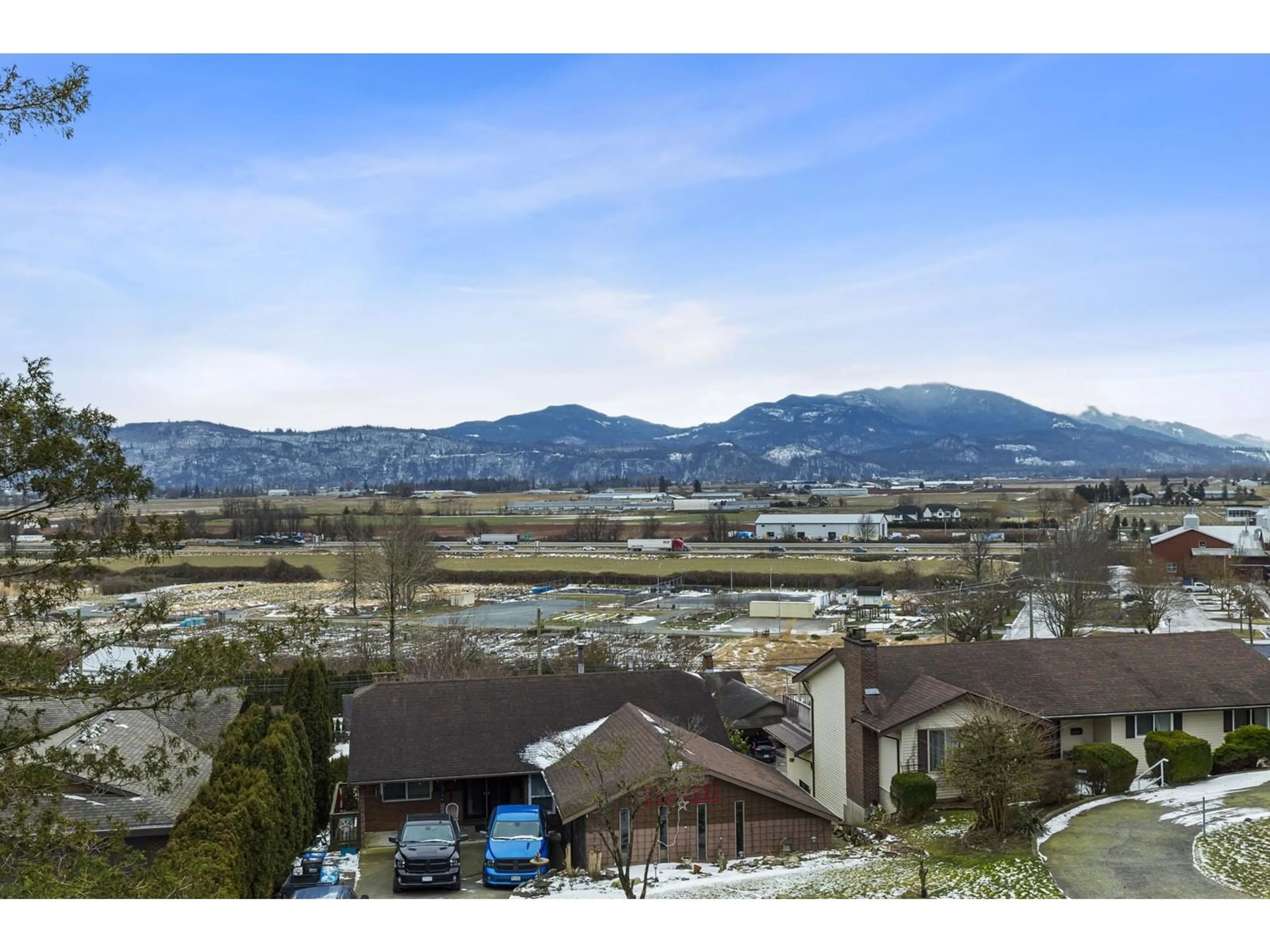 A pic from outside/outdoor area/front of a property/back of a property/a pic from drone, mountain view for 35337 ROCKWELL DRIVE, Abbotsford British Columbia V3G2C9