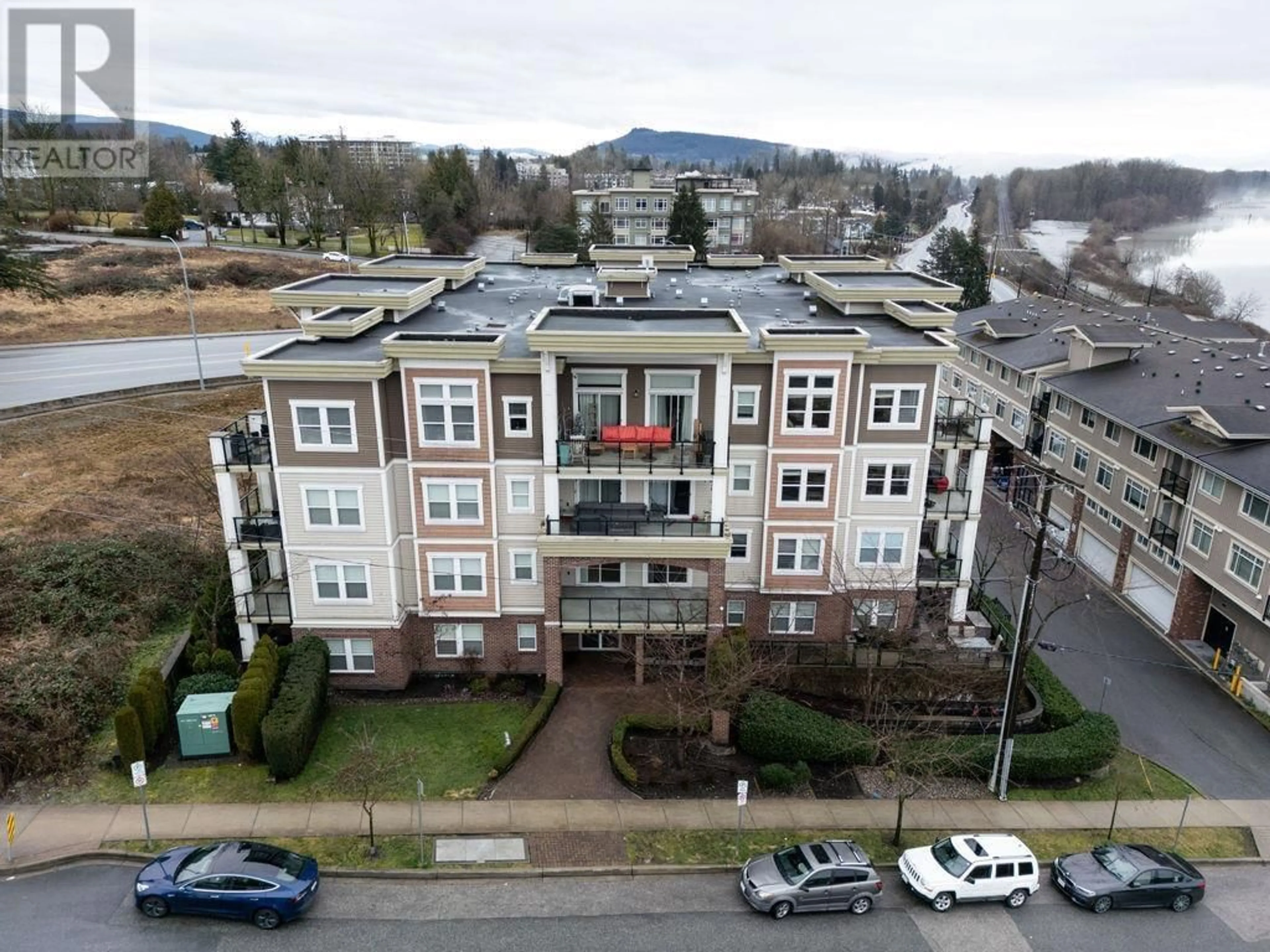 A pic from outside/outdoor area/front of a property/back of a property/a pic from drone, building for 213 11580 223 STREET, Maple Ridge British Columbia V2X9H1