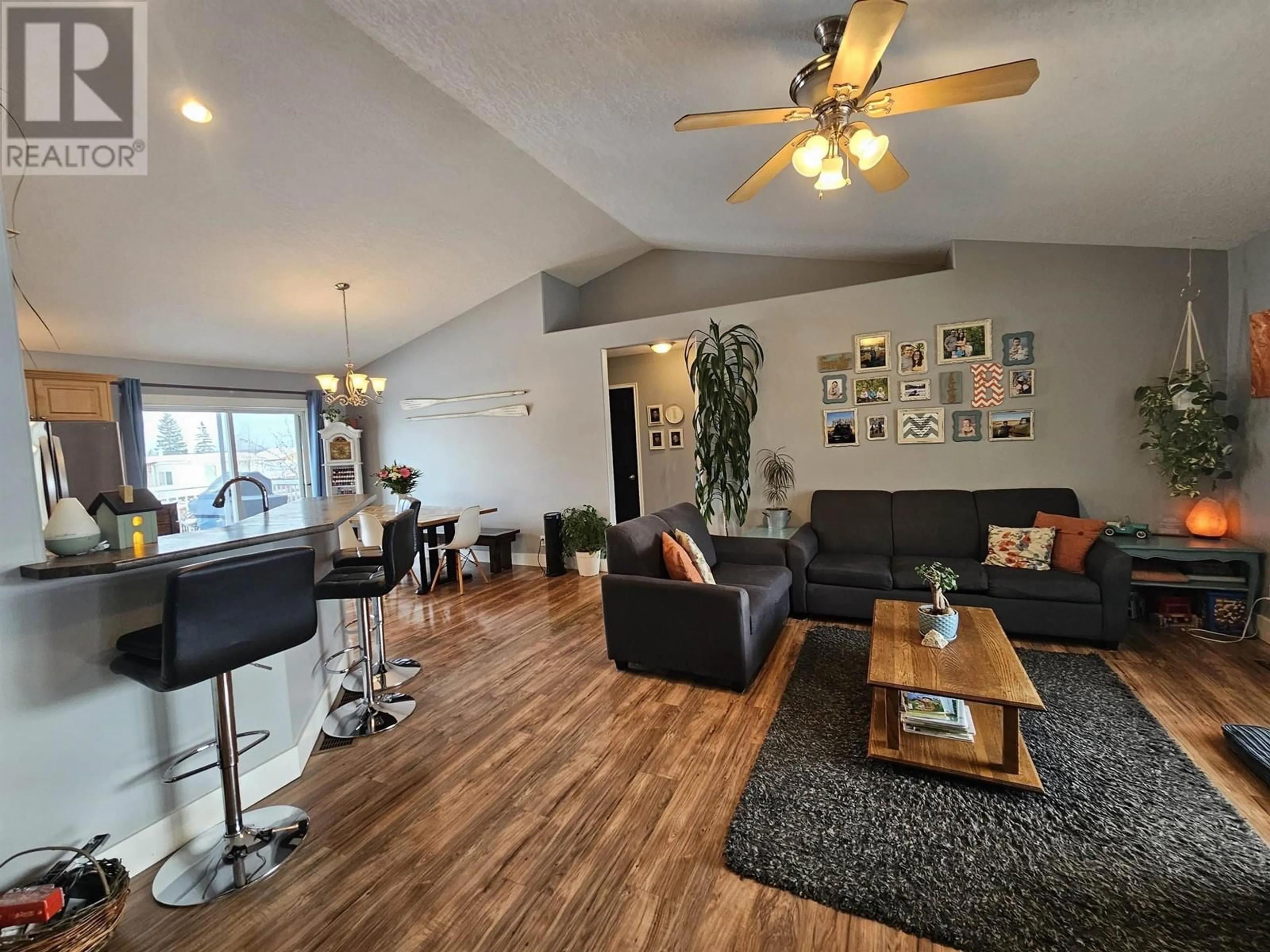 Living room with furniture, wood/laminate floor for 3456 HARGREAVES AVENUE, Vanderhoof British Columbia V0J3A0