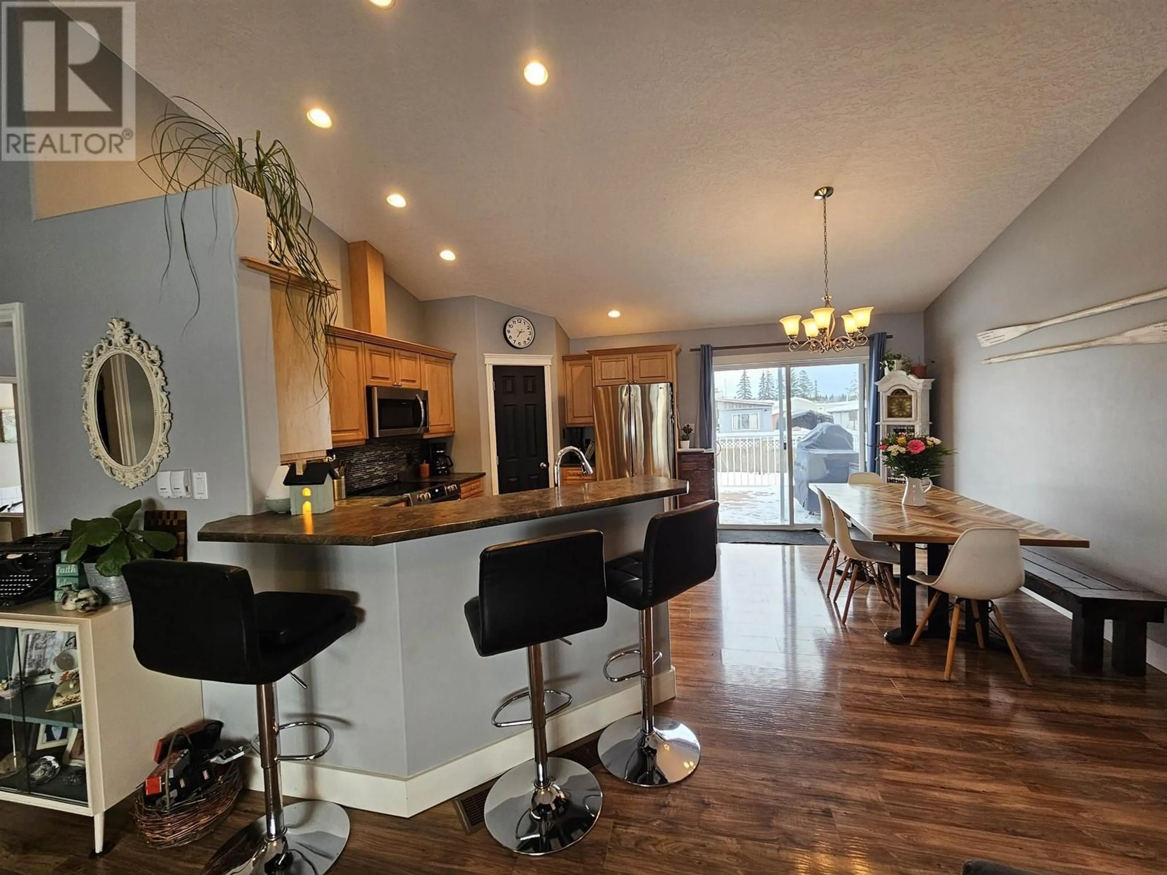 Open concept kitchen, wood/laminate floor for 3456 HARGREAVES AVENUE, Vanderhoof British Columbia V0J3A0