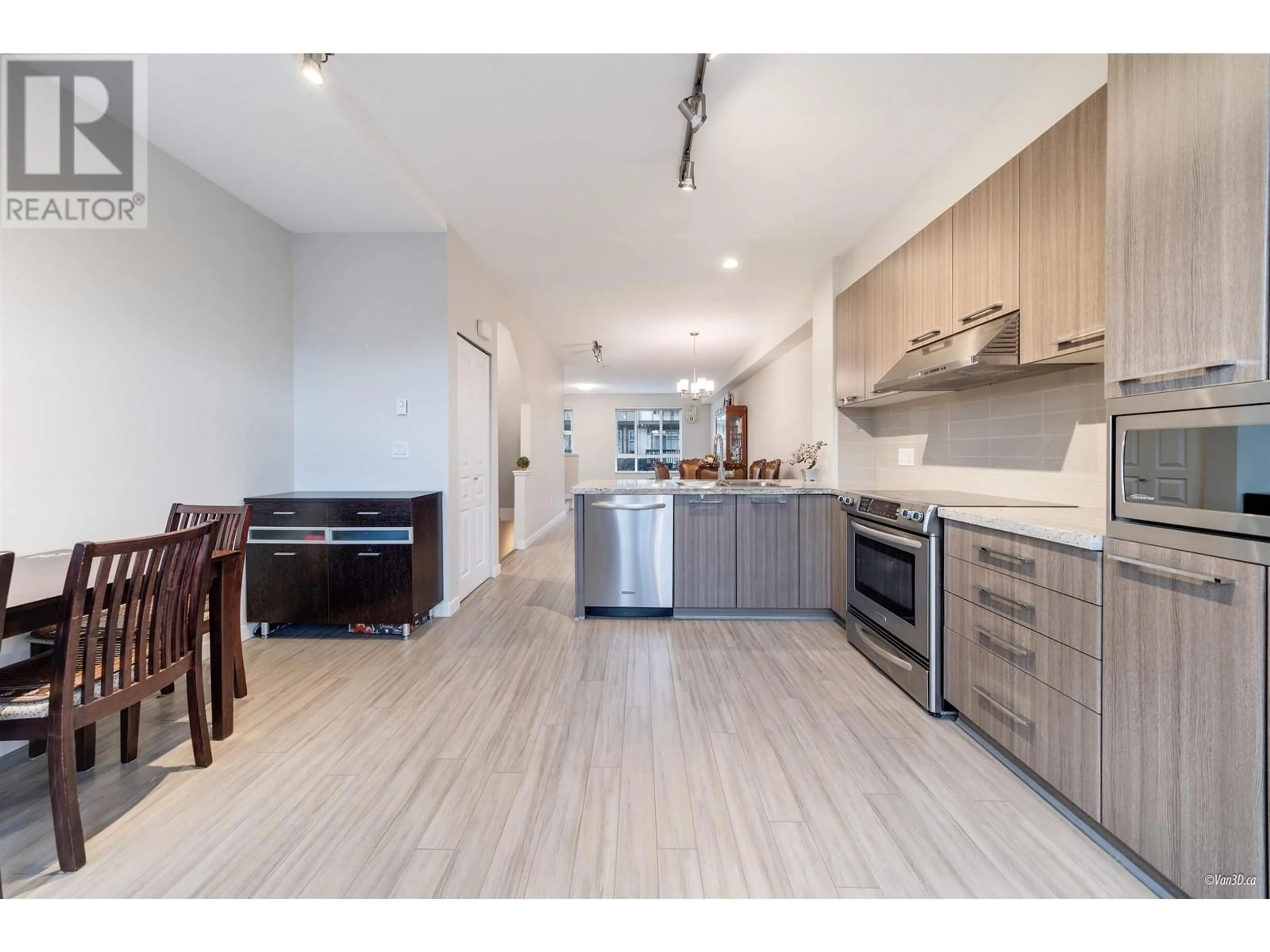 Open concept kitchen, wood/laminate floor for 54 1338 HAMES CRESCENT, Coquitlam British Columbia V3E0J2