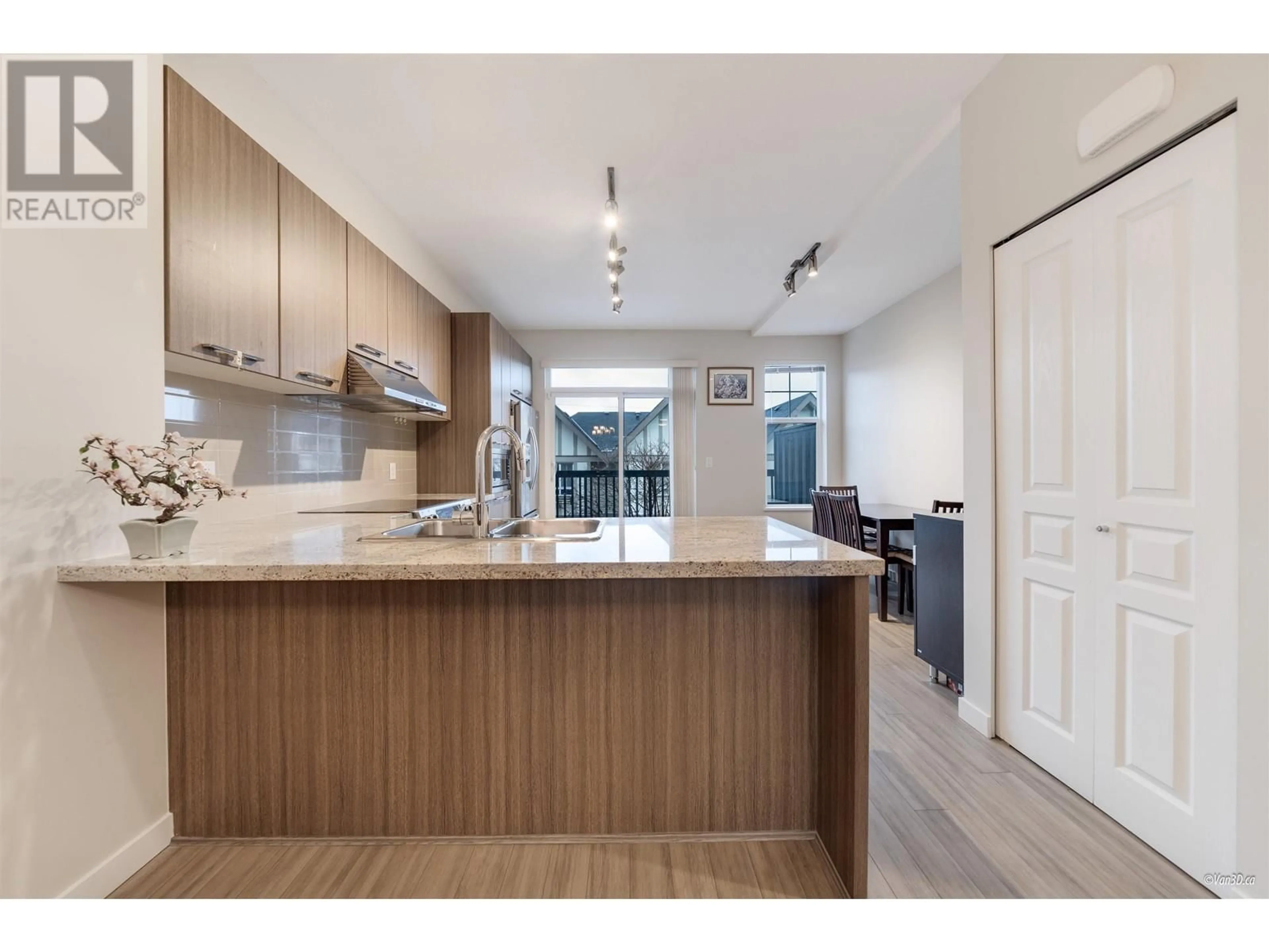 Open concept kitchen, wood/laminate floor for 54 1338 HAMES CRESCENT, Coquitlam British Columbia V3E0J2