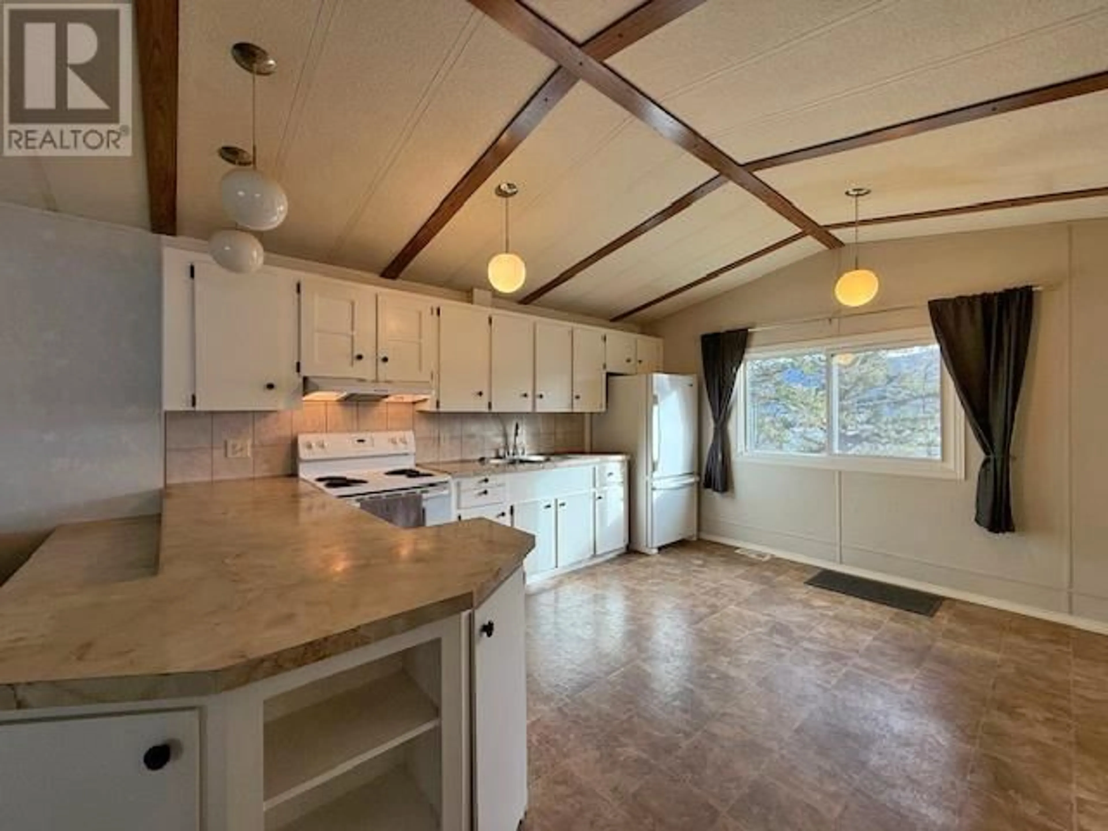 Open concept kitchen, ceramic/tile floor for 22-1700 S BROADWAY AVENUE, Williams Lake British Columbia V2G2W5