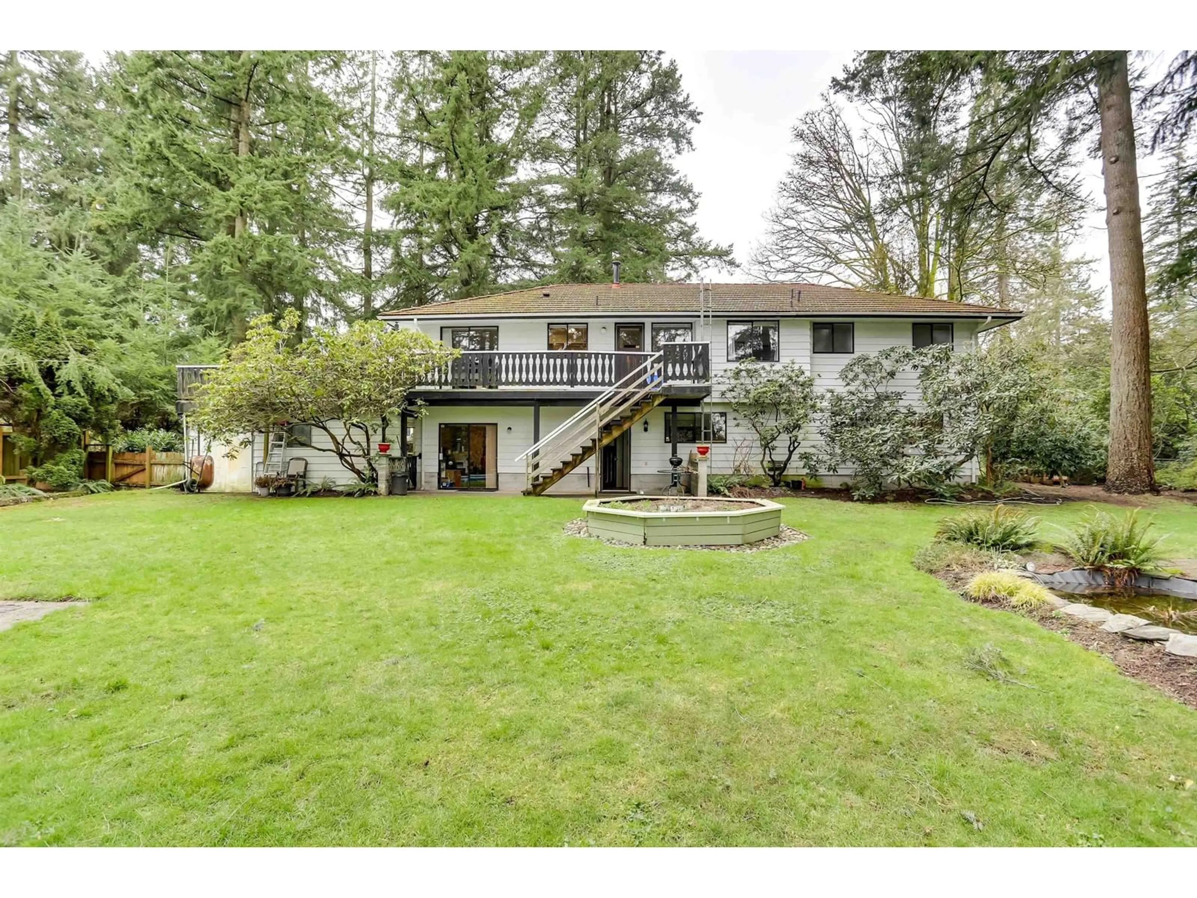 A pic from outside/outdoor area/front of a property/back of a property/a pic from drone, unknown for 2242 173, Surrey British Columbia V3Z9Z7