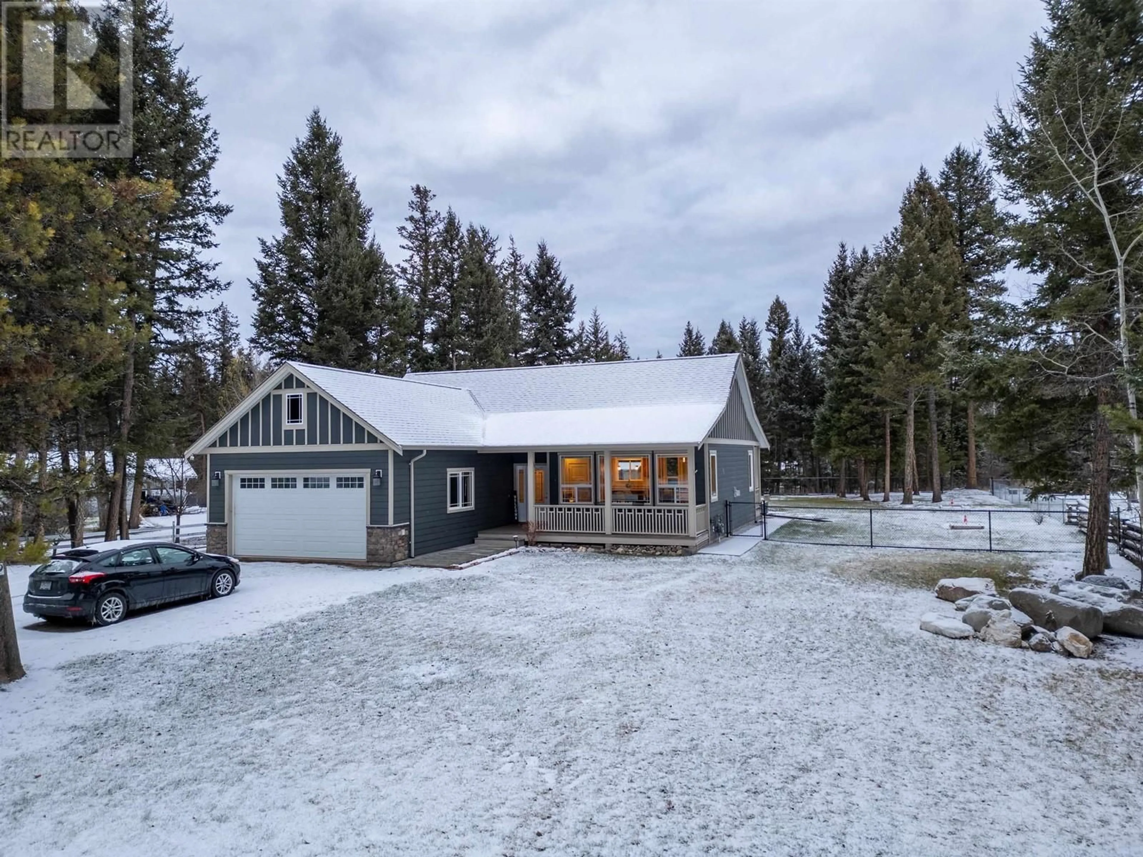 A pic from outside/outdoor area/front of a property/back of a property/a pic from drone, street for 4889 CANIUM COURT, 108 Mile Ranch British Columbia V0K2Z0