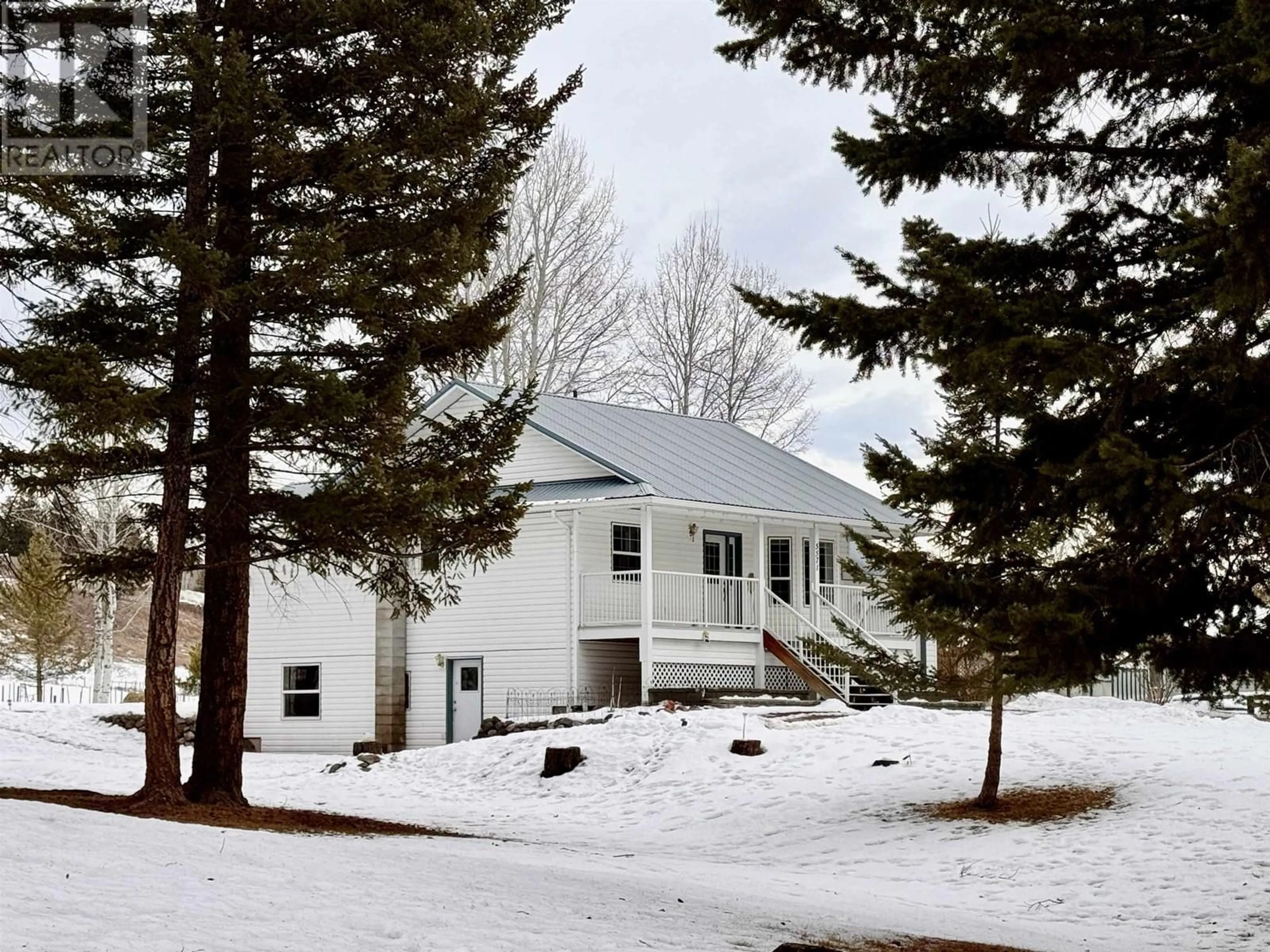 A pic from outside/outdoor area/front of a property/back of a property/a pic from drone, unknown for 5571 LAKESIDE COURT, 100 Mile House British Columbia V0K2E1